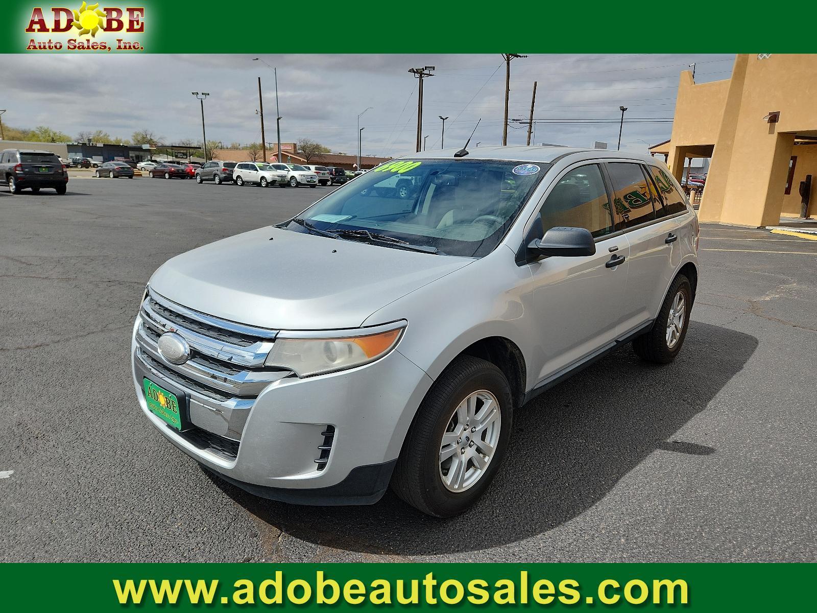 2012 Ingot Silver Metallic /Charcoal Black Cloth Interior Ford Edge SE (2FMDK3GC8CB) with an 3.5L TI-VCT V6 ENGINE engine, located at 4711 Ave Q, Lubbock, TX, 79412, (806) 687-2362, 33.551304, -101.855293 - Photo #0