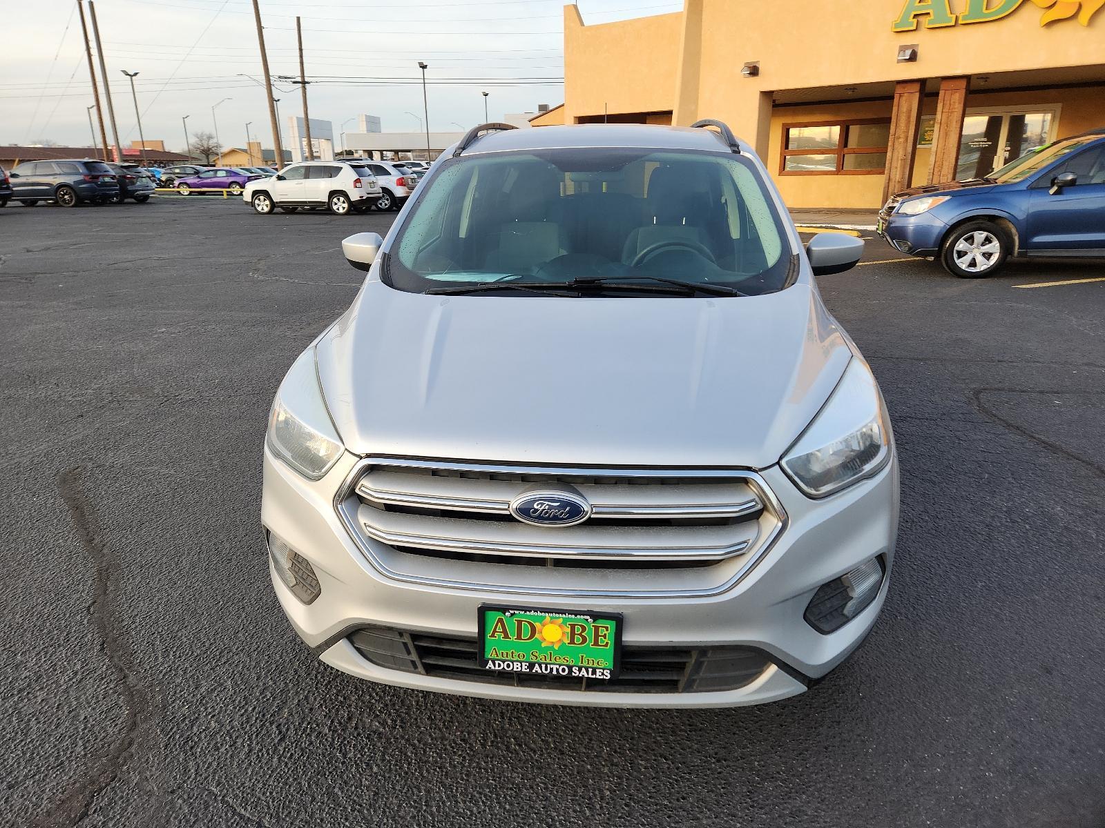 2018 Oxford White /Charcoal Black, cloth Ford Escape SE (1FMCU0GD5JU) with an ENGINE: 1.5L ECOBOOST engine, located at 4711 Ave Q, Lubbock, TX, 79412, (806) 687-2362, 33.551304, -101.855293 - Photo #7
