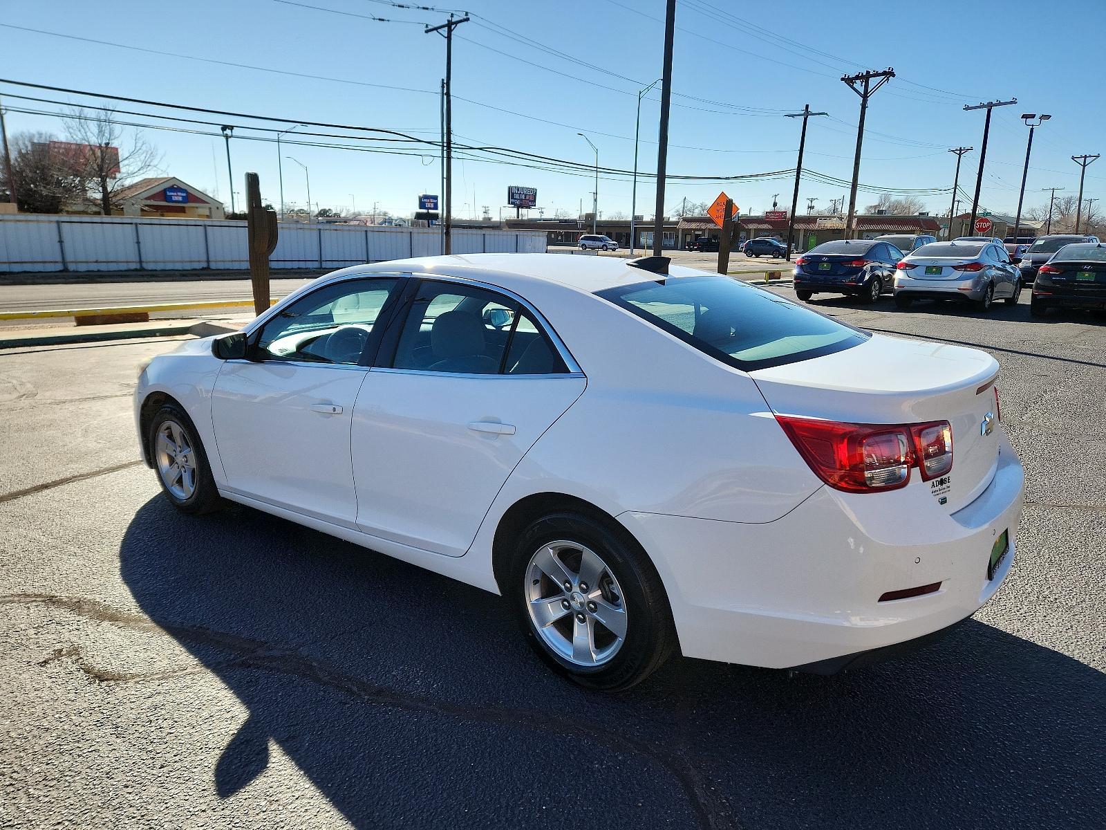 2016 White /Gray Chevrolet Malibu Limited LS (1G11A5SA6GF) with an ENGINE, 2.5L DOHC 4-CYLINDER SIDI engine, located at 4711 Ave Q, Lubbock, TX, 79412, (806) 687-2362, 33.551304, -101.855293 - Photo #2