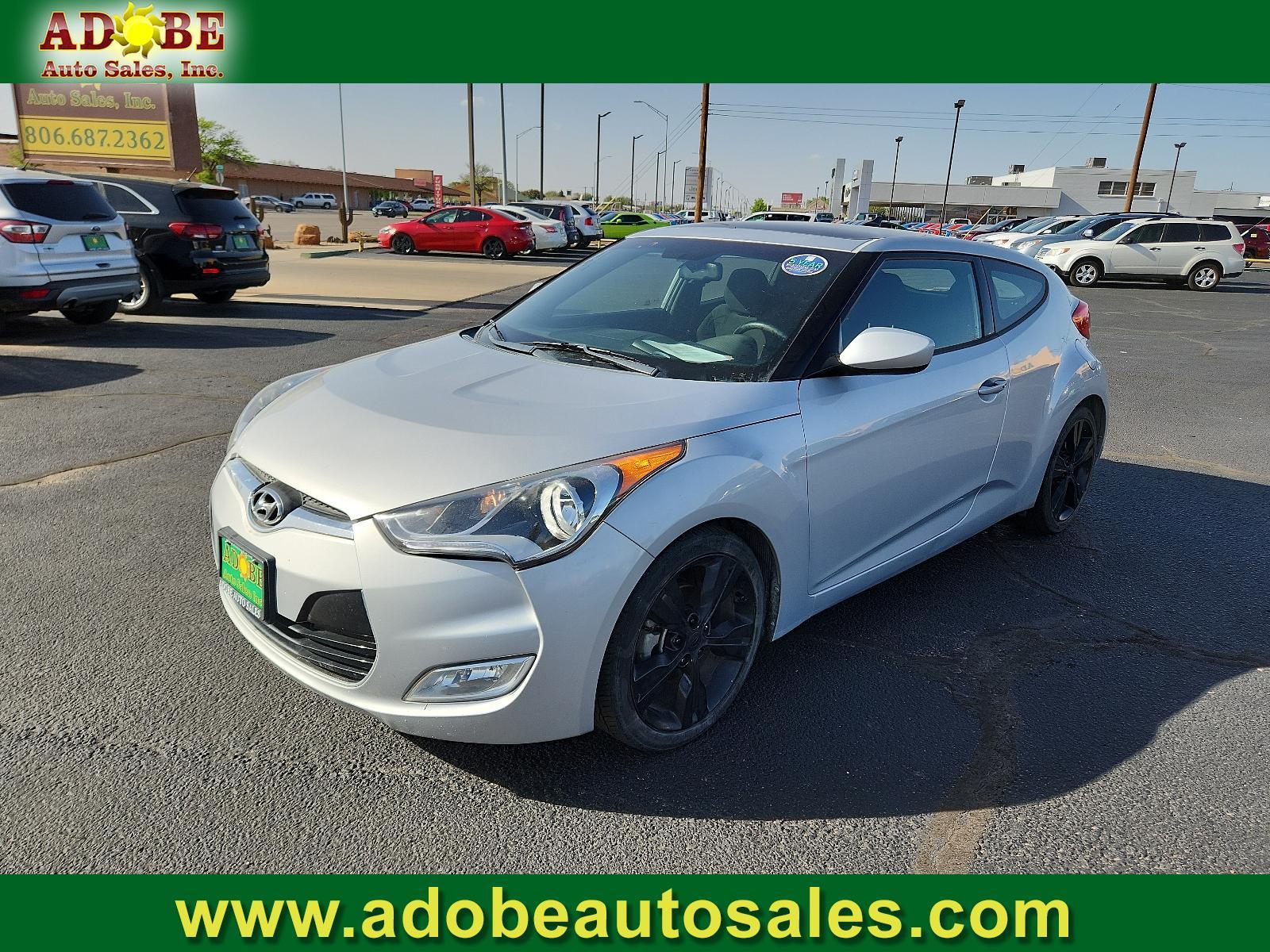 2017 Ironman Silver /Black, premium cloth Hyundai Veloster Value Edition (KMHTC6ADXHU) with an Engine: 1.6L 4-Cylinder GDI DOHC engine, located at 4711 Ave Q, Lubbock, TX, 79412, (806) 687-2362, 33.551304, -101.855293 - Photo #0