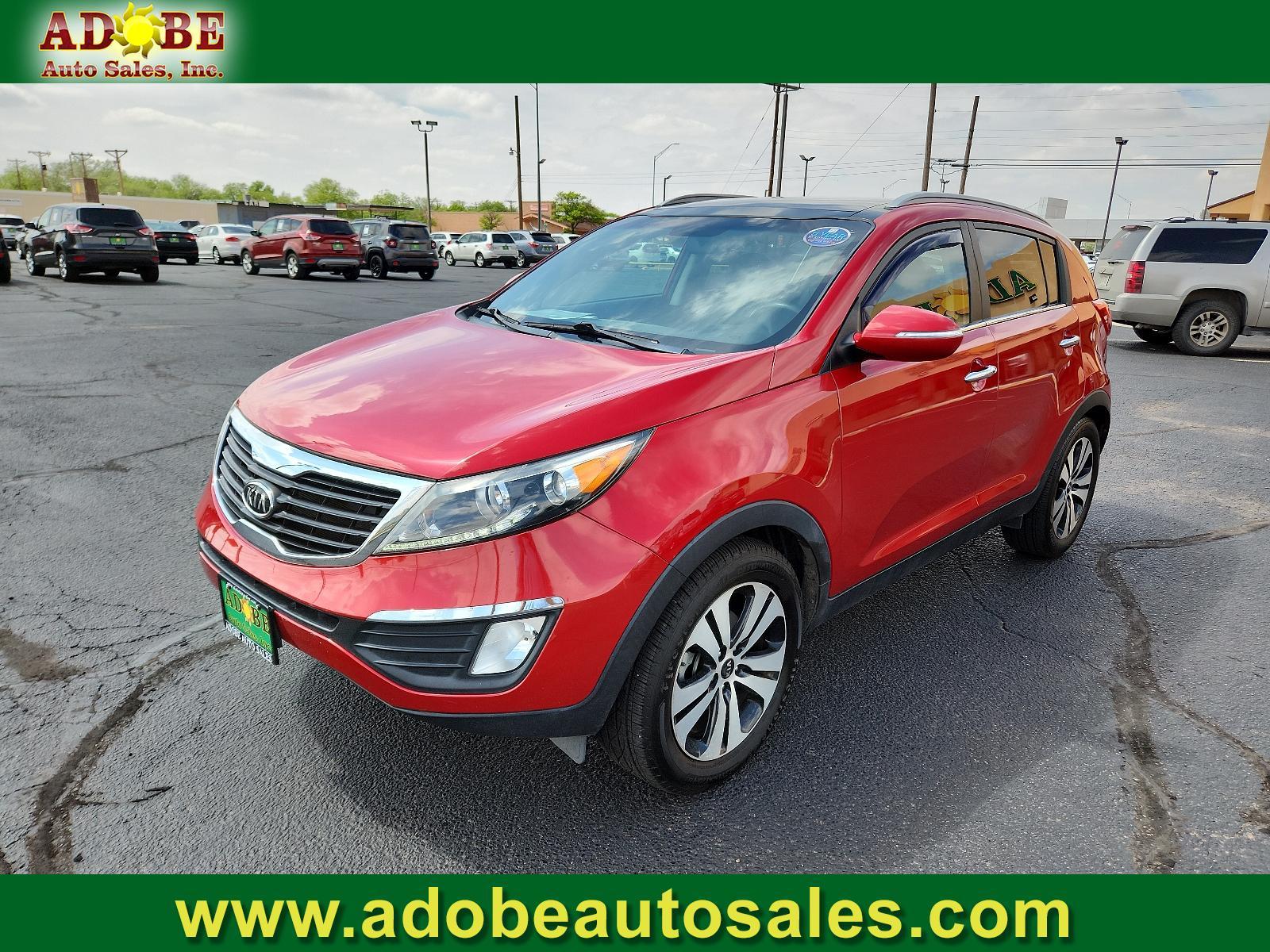2012 Signal Red Metallic /Black Leather Interior Kia Sportage EX (KNDPC3A23C7) with an 2.4L DOHC 16-valve I4 engine engine, located at 4711 Ave Q, Lubbock, TX, 79412, (806) 687-2362, 33.551304, -101.855293 - Photo #0