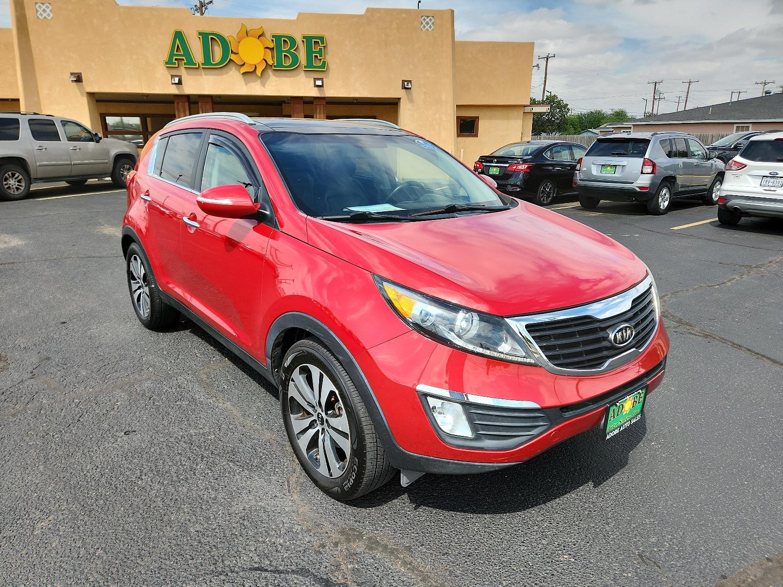 2012 Signal Red Metallic /Black Leather Interior Kia Sportage EX (KNDPC3A23C7) with an 2.4L DOHC 16-valve I4 engine engine, located at 4711 Ave Q, Lubbock, TX, 79412, (806) 687-2362, 33.551304, -101.855293 - Photo #6