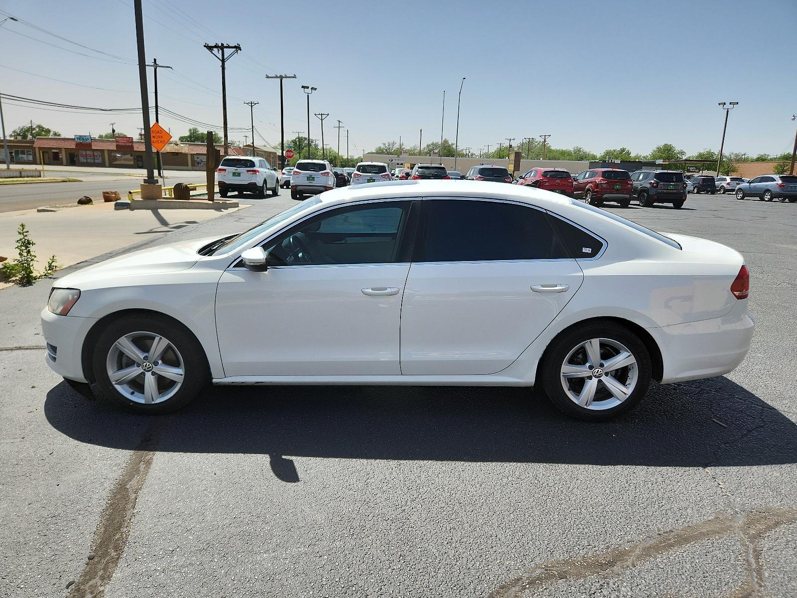 2012 Candy White /Beige Leatherette Interior Volkswagen Passat SE w/Sunroof and Nav PZEV (1VWBP7A33CC) with an 2.5L MPFI DOHC 20-valve I5 PZEV engine -inc: 118 mph speed limiter engine, located at 4711 Ave Q, Lubbock, TX, 79412, (806) 687-2362, 33.551304, -101.855293 - Photo #1