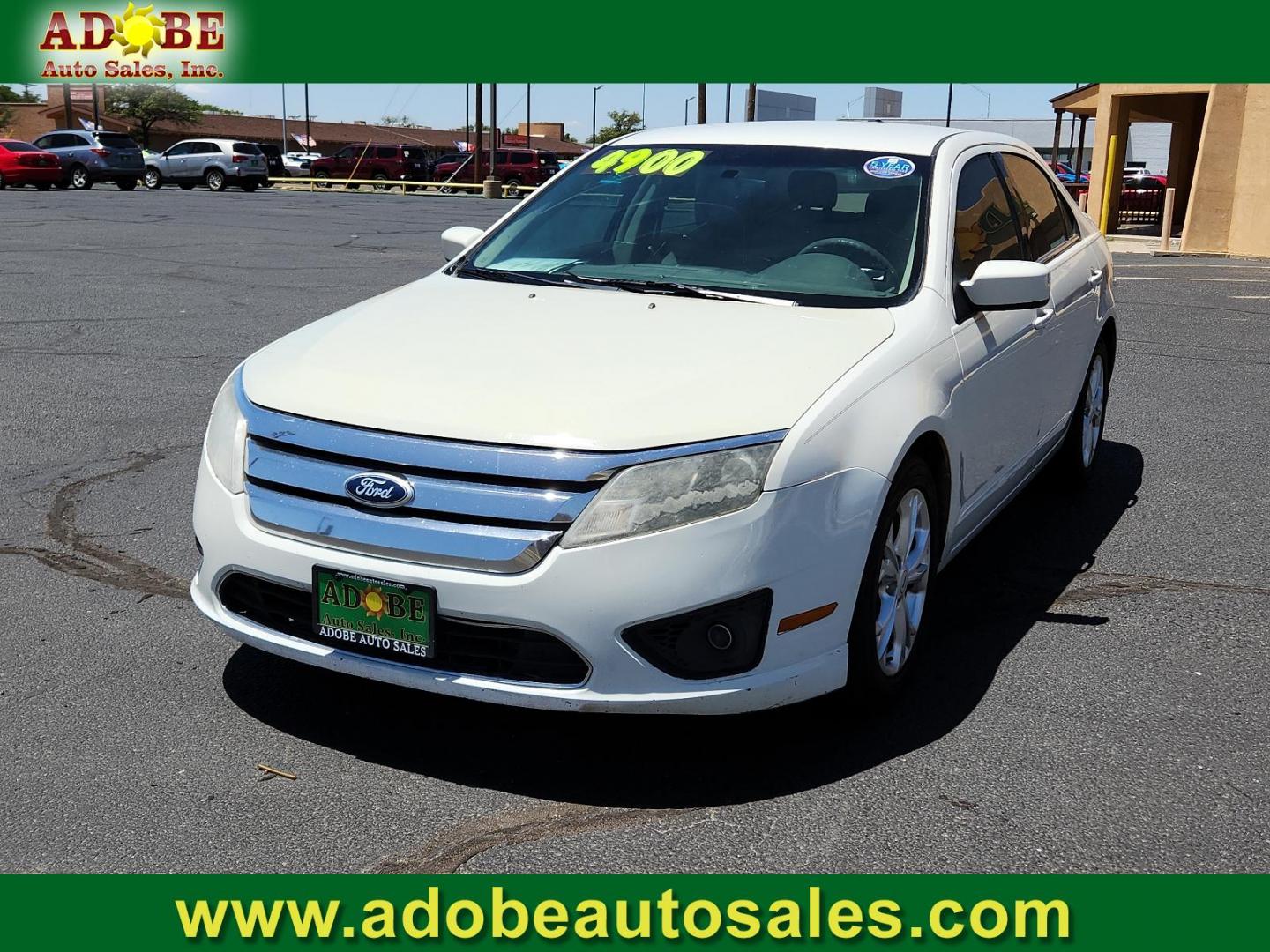 2012 White Suede /Camel Cloth Interior Ford Fusion SE (3FAHP0HA9CR) with an 2.5L 16V I4 DURATEC ENGINE engine, located at 4711 Ave Q, Lubbock, TX, 79412, (806) 687-2362, 33.551304, -101.855293 - Photo#0