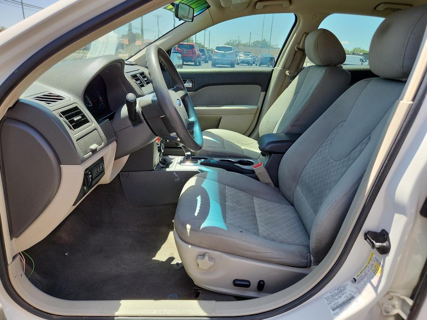 2012 White Suede /Camel Cloth Interior Ford Fusion SE (3FAHP0HA9CR) with an 2.5L 16V I4 DURATEC ENGINE engine, located at 4711 Ave Q, Lubbock, TX, 79412, (806) 687-2362, 33.551304, -101.855293 - Photo#12