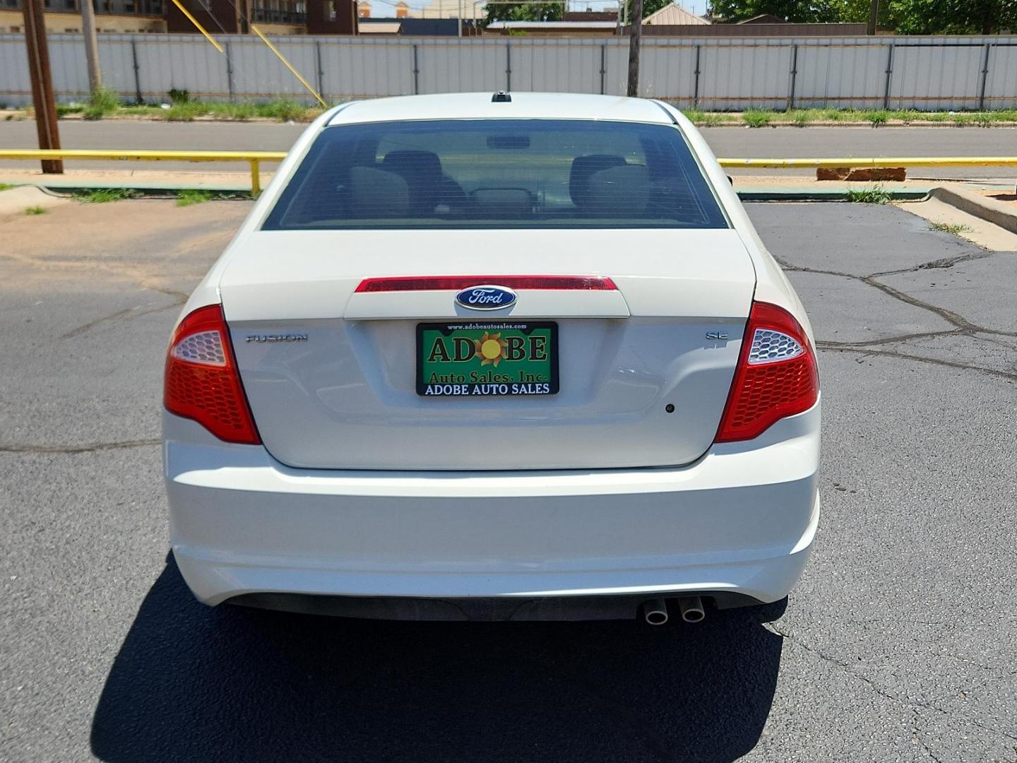 2012 White Suede /Camel Cloth Interior Ford Fusion SE (3FAHP0HA9CR) with an 2.5L 16V I4 DURATEC ENGINE engine, located at 4711 Ave Q, Lubbock, TX, 79412, (806) 687-2362, 33.551304, -101.855293 - Photo#3