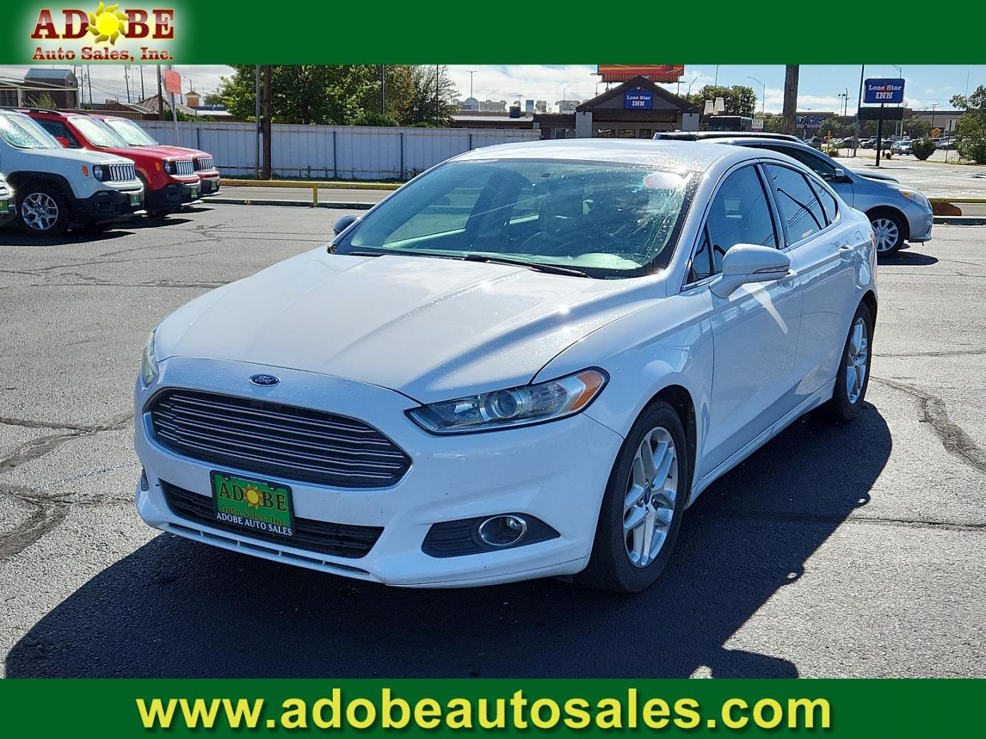 2013 Oxford White /Charcoal Black Ford Fusion SE (3FA6P0HR5DR) with an 1.6L ECOBOOST GTDI I4 ENGINE engine, located at 4711 Ave Q, Lubbock, TX, 79412, (806) 687-2362, 33.551304, -101.855293 - Photo#0