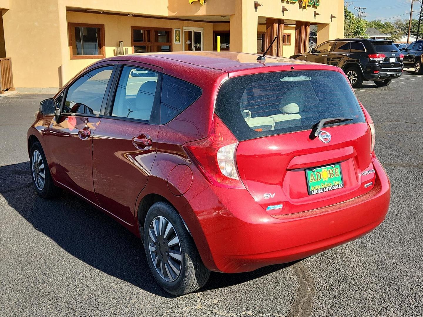 2014 Red Brick Metallic /Charcoal Nissan Versa Note SV (3N1CE2CP5EL) with an Engine: 1.6L DOHC 16-Valve 4-Cylinder engine, located at 4711 Ave Q, Lubbock, TX, 79412, (806) 687-2362, 33.551304, -101.855293 - Photo#2