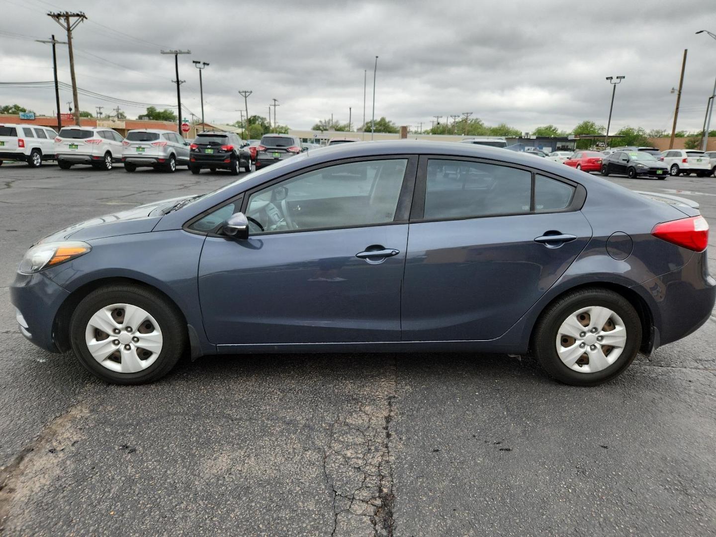 2015 Graphite Steel /Black Kia Forte LX (KNAFX4A63F5) with an Engine: 1.8L I4 DOHC D-CVVT engine, located at 4711 Ave Q, Lubbock, TX, 79412, (806) 687-2362, 33.551304, -101.855293 - Photo#1