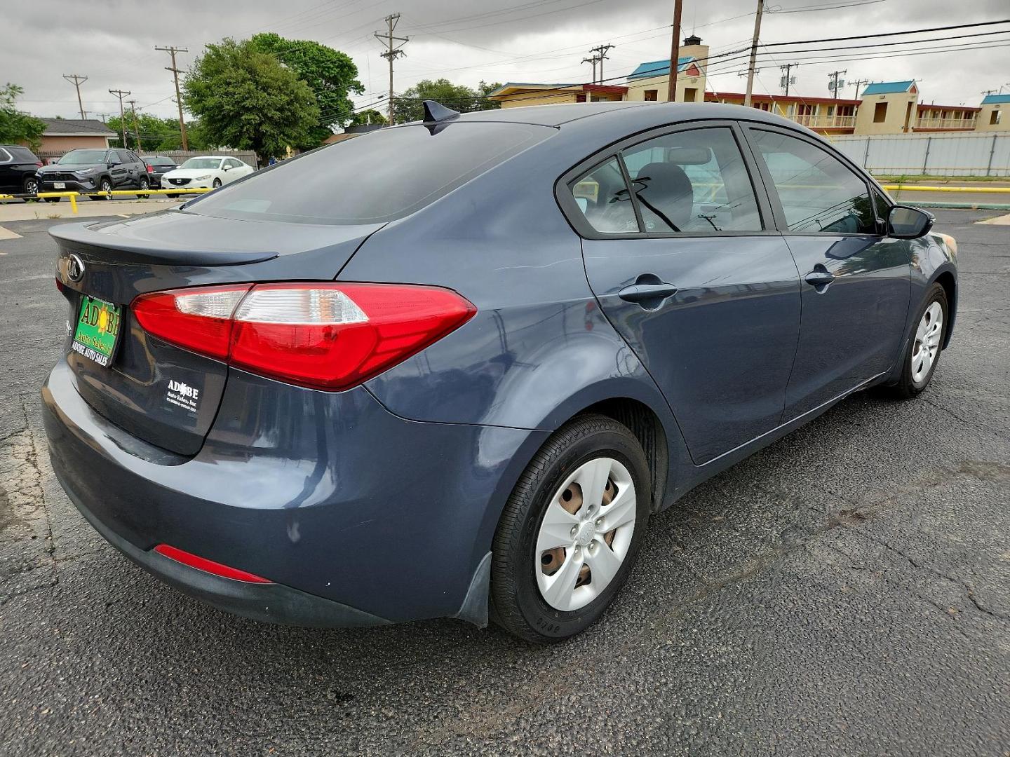 2015 Graphite Steel /Black Kia Forte LX (KNAFX4A63F5) with an Engine: 1.8L I4 DOHC D-CVVT engine, located at 4711 Ave Q, Lubbock, TX, 79412, (806) 687-2362, 33.551304, -101.855293 - Photo#4