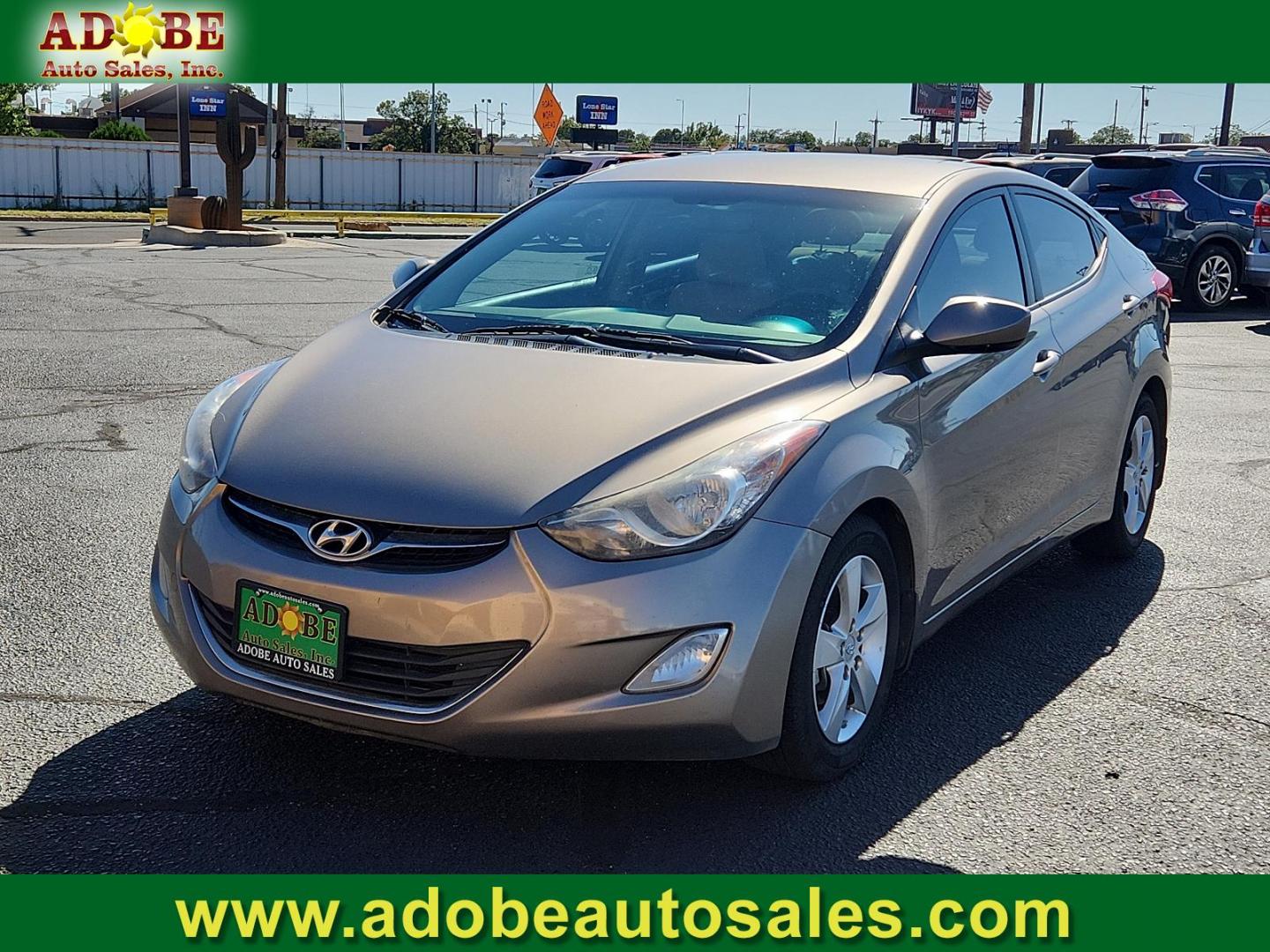 2013 Desert Bronze - RNZ /Beige - YDA Hyundai Elantra GLS (5NPDH4AE1DH) with an 1.8L DOHC MPFI D-CVVT 16-valve I4 engine engine, located at 4711 Ave Q, Lubbock, TX, 79412, (806) 687-2362, 33.551304, -101.855293 - Photo#0