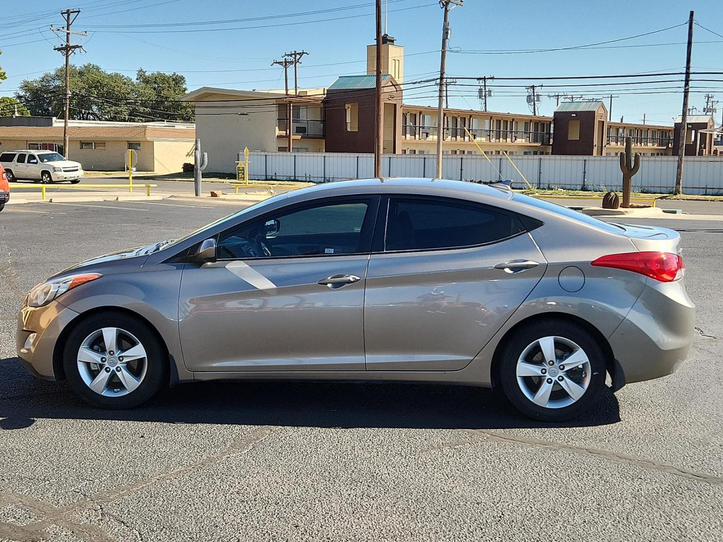 2013 Desert Bronze - RNZ /Beige - YDA Hyundai Elantra GLS (5NPDH4AE1DH) with an 1.8L DOHC MPFI D-CVVT 16-valve I4 engine engine, located at 4711 Ave Q, Lubbock, TX, 79412, (806) 687-2362, 33.551304, -101.855293 - Photo#1