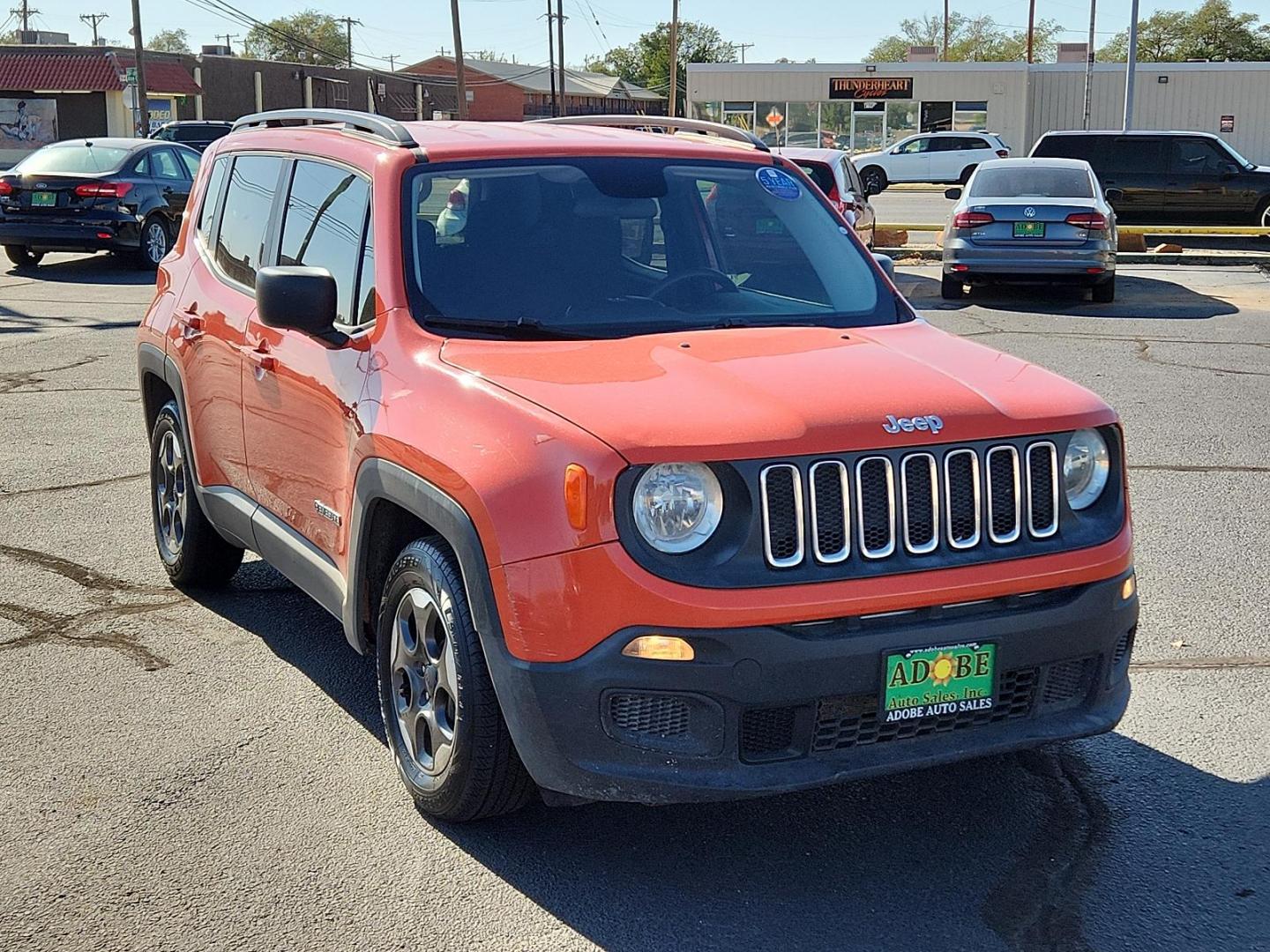 2017 Omaha Orange /Black, cloth Jeep Renegade Sport (ZACCJAABXHP) with an ENGINE: 2.4L I4 MULTIAIR engine, located at 4711 Ave Q, Lubbock, TX, 79412, (806) 687-2362, 33.551304, -101.855293 - Photo#1