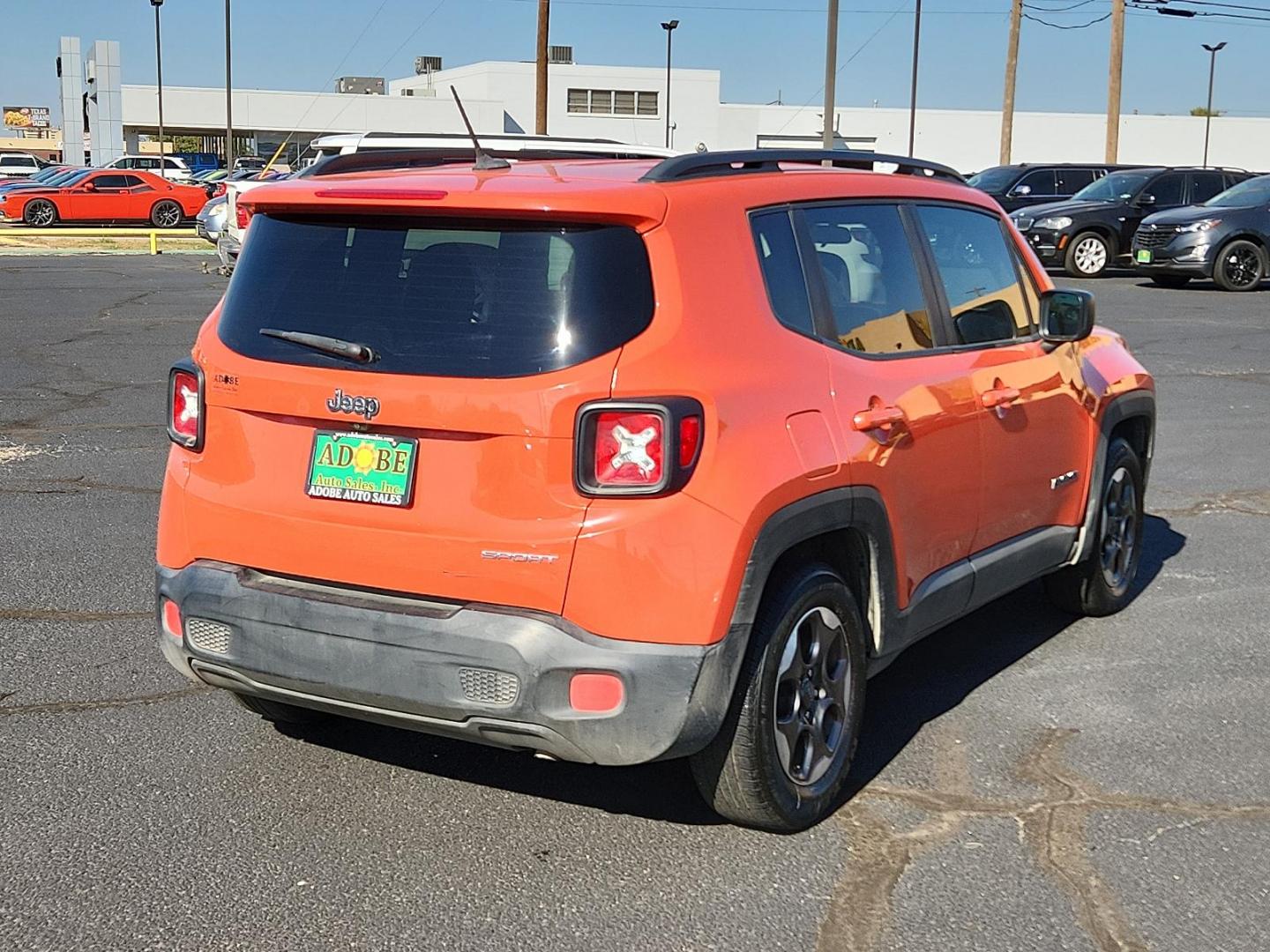 2017 Omaha Orange /Black, cloth Jeep Renegade Sport (ZACCJAABXHP) with an ENGINE: 2.4L I4 MULTIAIR engine, located at 4711 Ave Q, Lubbock, TX, 79412, (806) 687-2362, 33.551304, -101.855293 - Photo#3