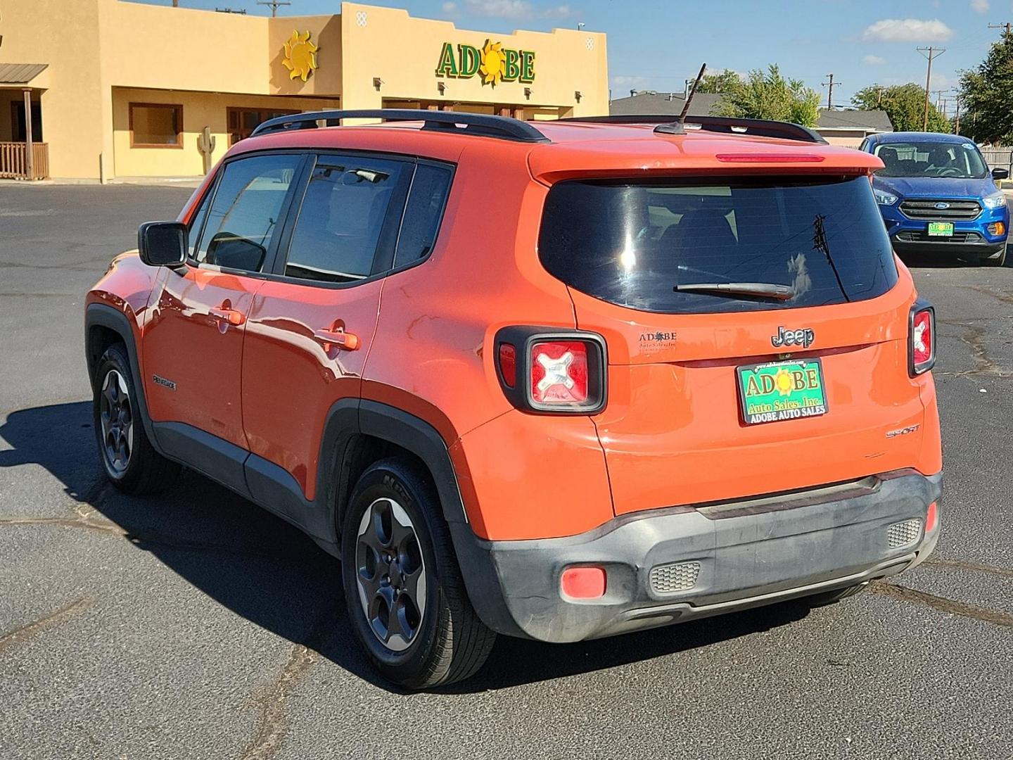 2017 Omaha Orange /Black, cloth Jeep Renegade Sport (ZACCJAABXHP) with an ENGINE: 2.4L I4 MULTIAIR engine, located at 4711 Ave Q, Lubbock, TX, 79412, (806) 687-2362, 33.551304, -101.855293 - Photo#4