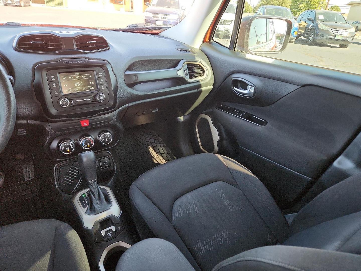 2017 Omaha Orange /Black, cloth Jeep Renegade Sport (ZACCJAABXHP) with an ENGINE: 2.4L I4 MULTIAIR engine, located at 4711 Ave Q, Lubbock, TX, 79412, (806) 687-2362, 33.551304, -101.855293 - Photo#9