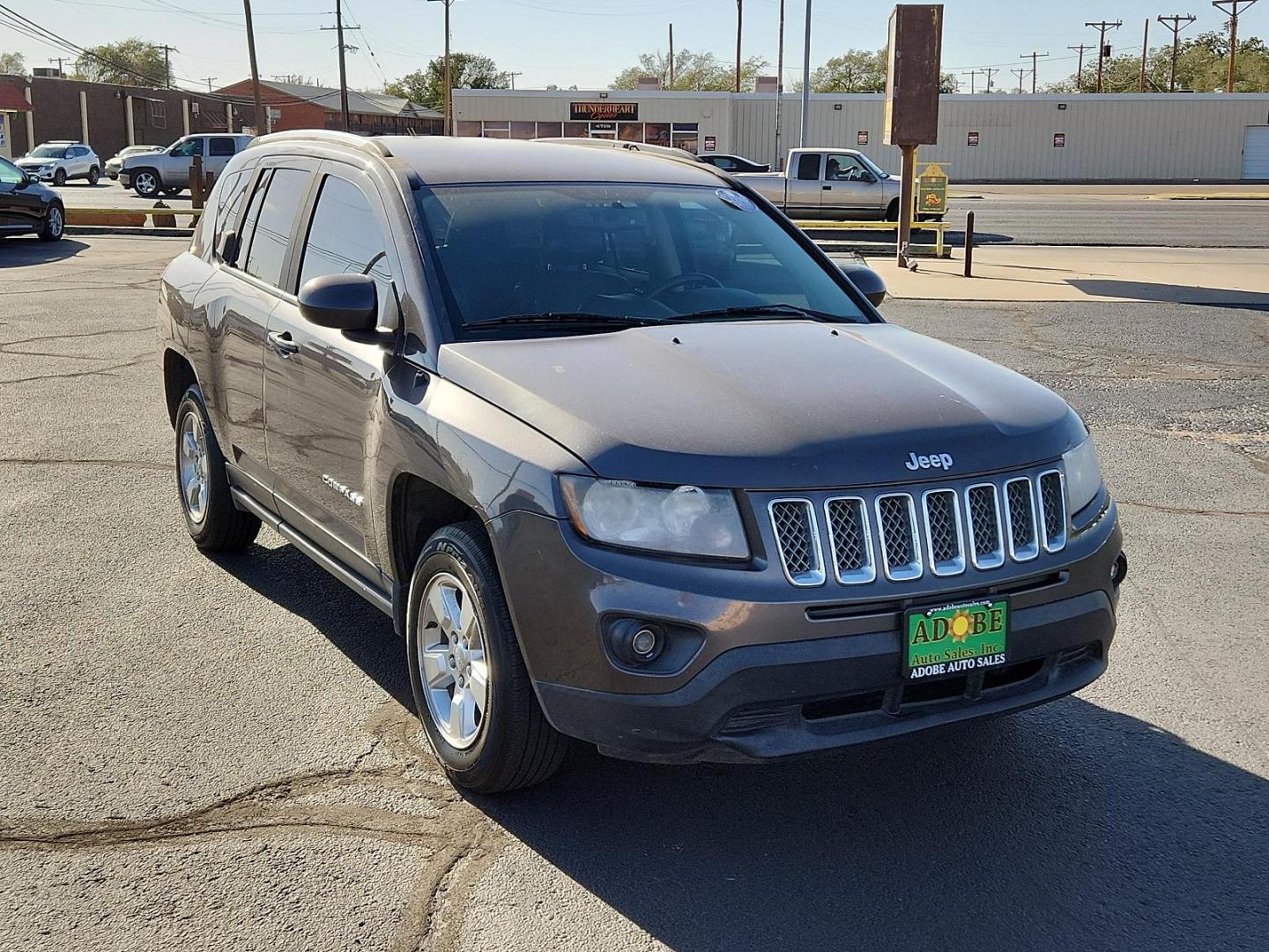 2016 Gray /Dark Slate Gray, vinyl/cloth Jeep Compass Latitude (1C4NJCEBXGD) with an ENGINE: 2.4L I4 DOHC 16V DUAL VVT engine, located at 4711 Ave Q, Lubbock, TX, 79412, (806) 687-2362, 33.551304, -101.855293 - Photo#1