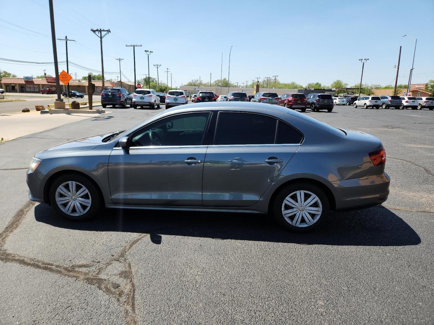 2017 Platinum Gray Metallic /Titan Black/Palladium Gray, cloth Volkswagen Jetta 1.4T S (3VW2B7AJ5HM) with an Engine: 1.4L TSI I-4 Turbocharged -inc: DOHC 16-valve, direct injection engine, located at 4711 Ave Q, Lubbock, TX, 79412, (806) 687-2362, 33.551304, -101.855293 - Photo#1