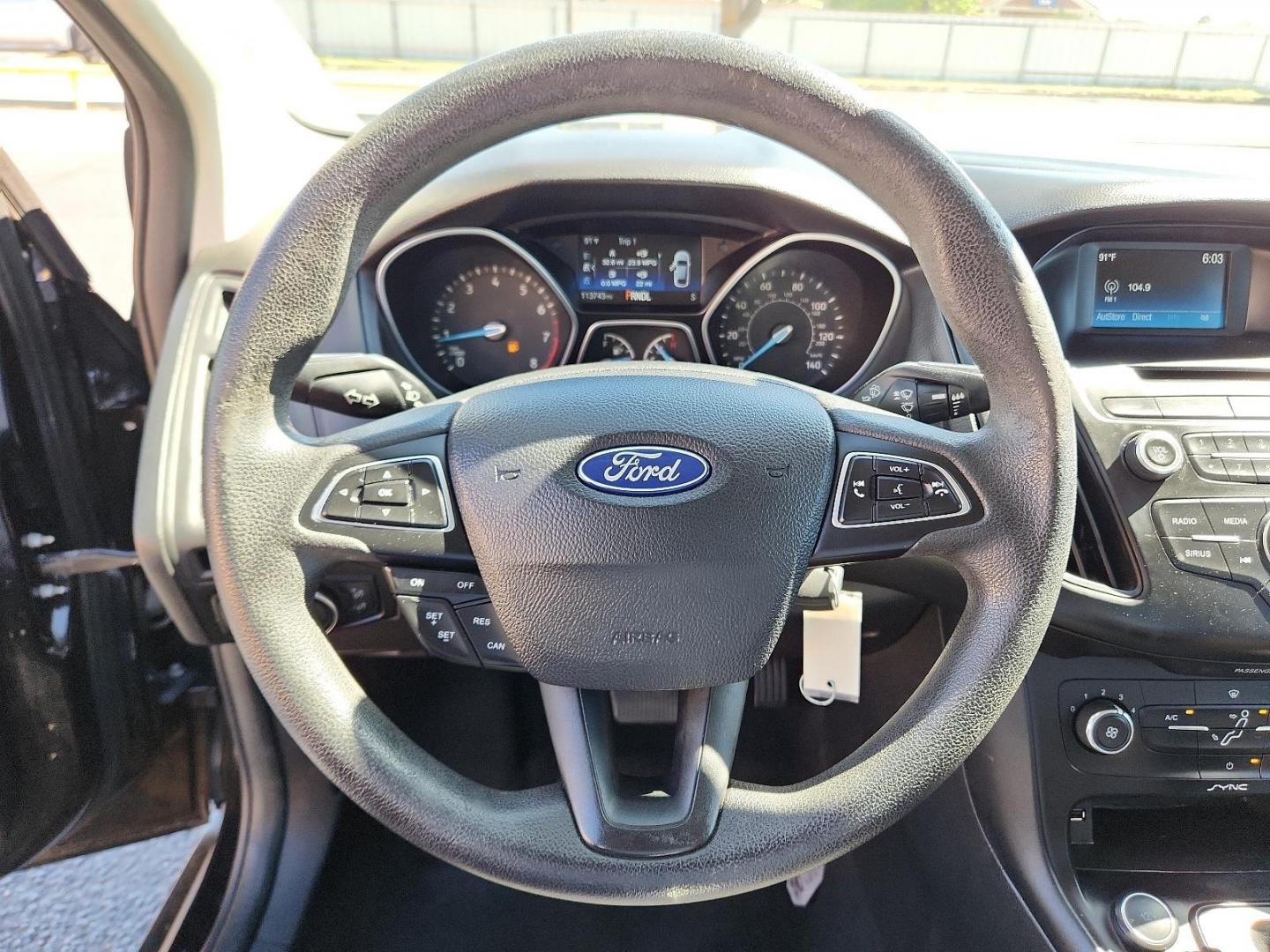 2017 Shadow Black /Charcoal Black Insert w/Warm Steel Surround, cloth Ford Focus SE (1FADP3F25HL) with an ENGINE: 2.0L I-4 GDI TI-VCT FLEX FUEL engine, located at 4711 Ave Q, Lubbock, TX, 79412, (806) 687-2362, 33.551304, -101.855293 - Photo#20