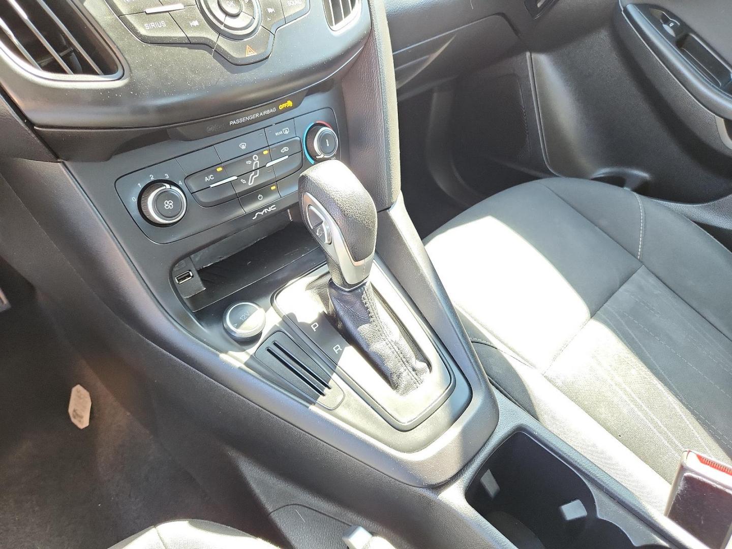 2017 Shadow Black /Charcoal Black Insert w/Warm Steel Surround, cloth Ford Focus SE (1FADP3F25HL) with an ENGINE: 2.0L I-4 GDI TI-VCT FLEX FUEL engine, located at 4711 Ave Q, Lubbock, TX, 79412, (806) 687-2362, 33.551304, -101.855293 - Photo#21