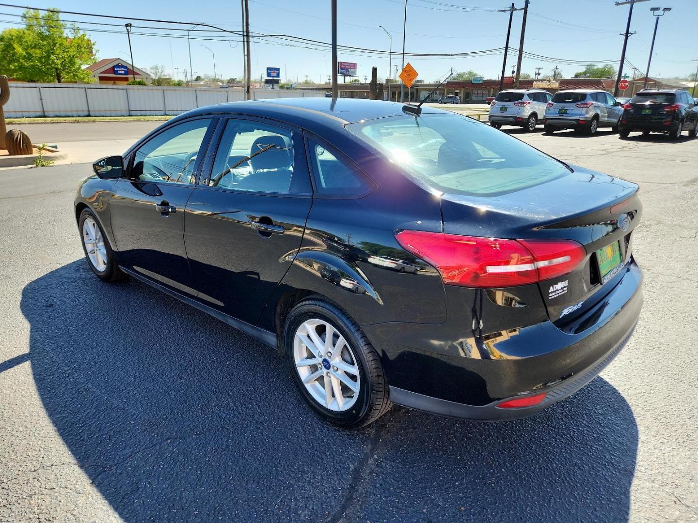 2017 Shadow Black /Charcoal Black Insert w/Warm Steel Surround, cloth Ford Focus SE (1FADP3F25HL) with an ENGINE: 2.0L I-4 GDI TI-VCT FLEX FUEL engine, located at 4711 Ave Q, Lubbock, TX, 79412, (806) 687-2362, 33.551304, -101.855293 - Photo#2