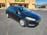 2017 Shadow Black /Charcoal Black Insert w/Warm Steel Surround, cloth Ford Focus SE (1FADP3F25HL) with an ENGINE: 2.0L I-4 GDI TI-VCT FLEX FUEL engine, located at 4711 Ave Q, Lubbock, TX, 79412, (806) 687-2362, 33.551304, -101.855293 - Photo#6