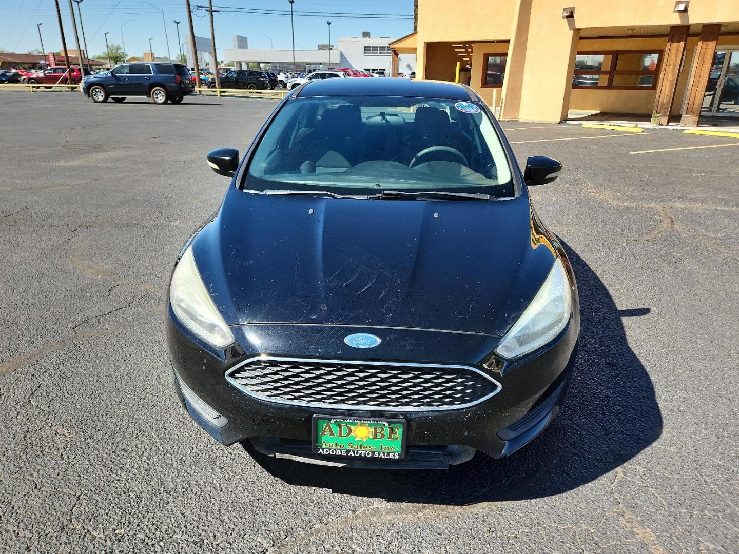 2017 Shadow Black /Charcoal Black Insert w/Warm Steel Surround, cloth Ford Focus SE (1FADP3F25HL) with an ENGINE: 2.0L I-4 GDI TI-VCT FLEX FUEL engine, located at 4711 Ave Q, Lubbock, TX, 79412, (806) 687-2362, 33.551304, -101.855293 - Photo#7