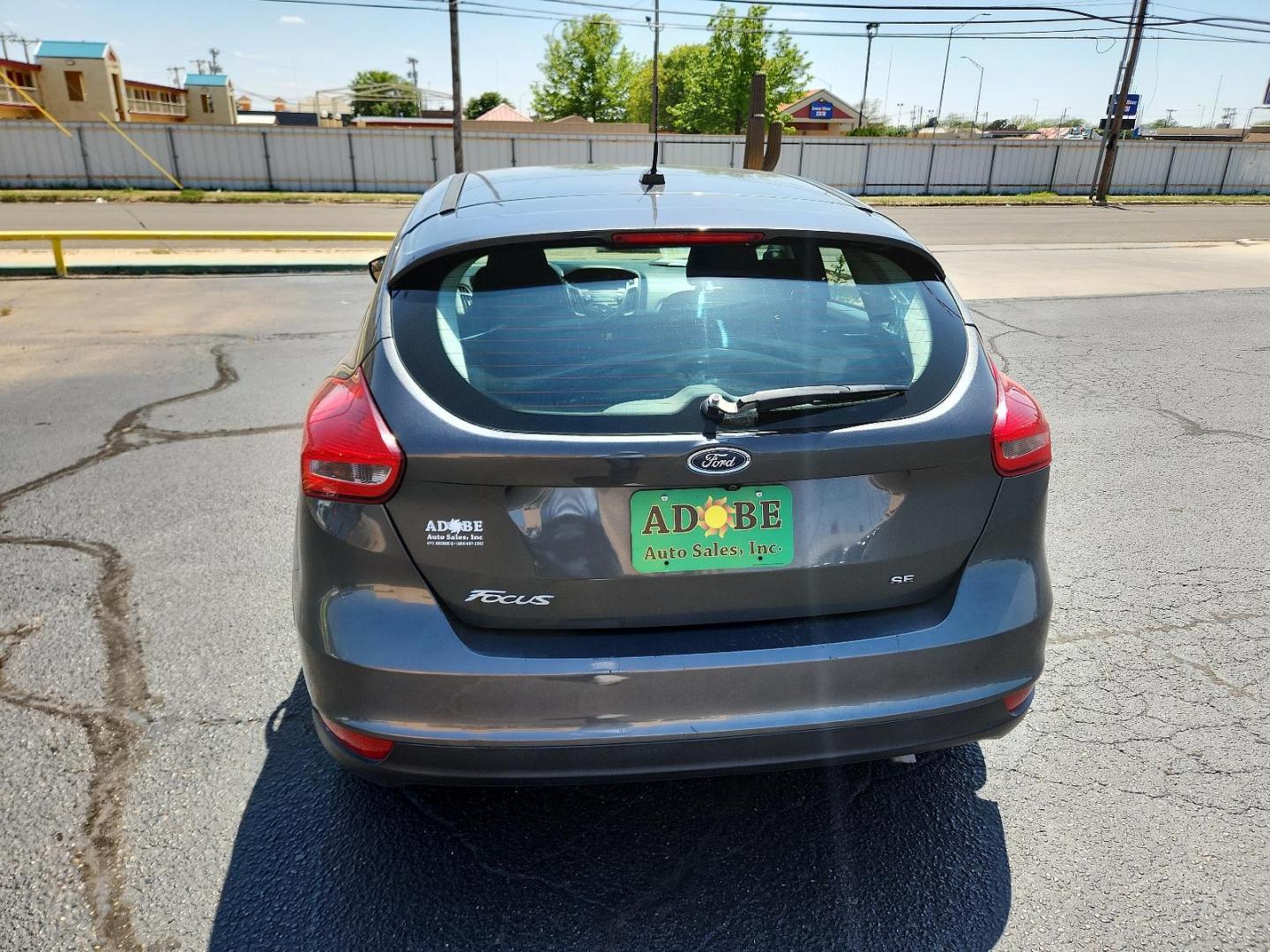 2017 Magnetic Metallic /Charcoal Black Insert w/Warm Steel Surround, cloth Ford Focus SE (1FADP3K29HL) with an ENGINE: 2.0L I-4 GDI TI-VCT FLEX FUEL engine, located at 4711 Ave Q, Lubbock, TX, 79412, (806) 687-2362, 33.551304, -101.855293 - Photo#3