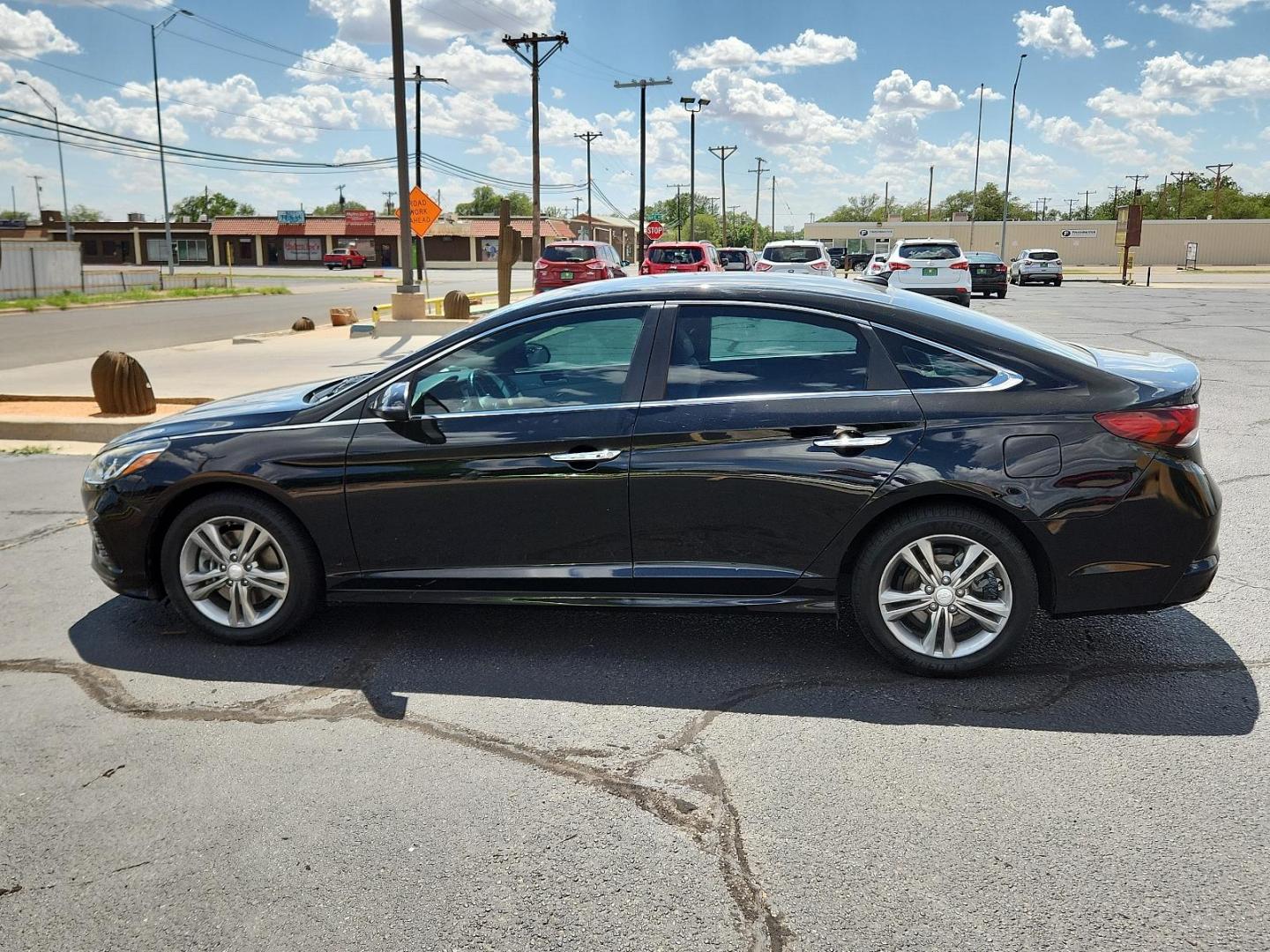 2019 Phantom Black /Black, leather/cloth Hyundai Sonata SEL (5NPE34AF0KH) with an Engine: 2.4L GDI DOHC 16-Valve I4 engine, located at 4711 Ave Q, Lubbock, TX, 79412, (806) 687-2362, 33.551304, -101.855293 - Photo#1