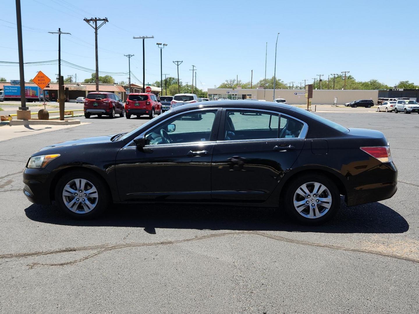 2012 Crystal Black Pearl /Black Leather Interior Honda Accord Sdn SE (1HGCP2F66CA) with an 2.4L DOHC MPFI 16-valve i-VTEC I4 engine engine, located at 4711 Ave Q, Lubbock, TX, 79412, (806) 687-2362, 33.551304, -101.855293 - Photo#1