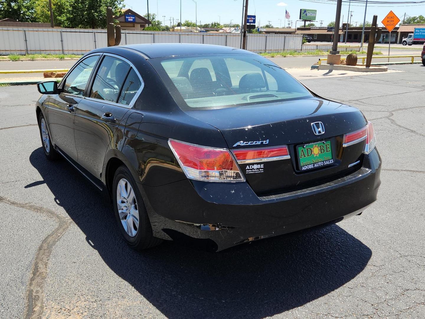 2012 Crystal Black Pearl /Black Leather Interior Honda Accord Sdn SE (1HGCP2F66CA) with an 2.4L DOHC MPFI 16-valve i-VTEC I4 engine engine, located at 4711 Ave Q, Lubbock, TX, 79412, (806) 687-2362, 33.551304, -101.855293 - Photo#2