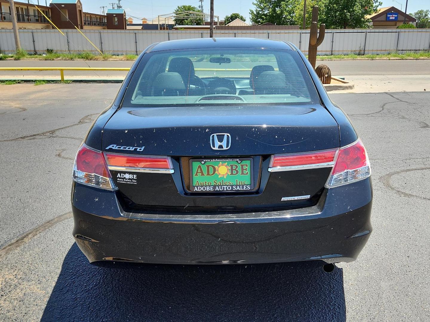 2012 Crystal Black Pearl /Black Leather Interior Honda Accord Sdn SE (1HGCP2F66CA) with an 2.4L DOHC MPFI 16-valve i-VTEC I4 engine engine, located at 4711 Ave Q, Lubbock, TX, 79412, (806) 687-2362, 33.551304, -101.855293 - Photo#3