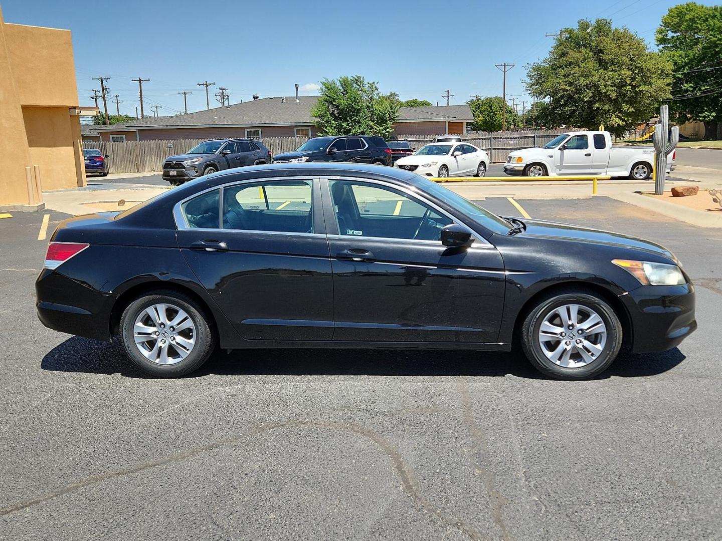 2012 Crystal Black Pearl /Black Leather Interior Honda Accord Sdn SE (1HGCP2F66CA) with an 2.4L DOHC MPFI 16-valve i-VTEC I4 engine engine, located at 4711 Ave Q, Lubbock, TX, 79412, (806) 687-2362, 33.551304, -101.855293 - Photo#5