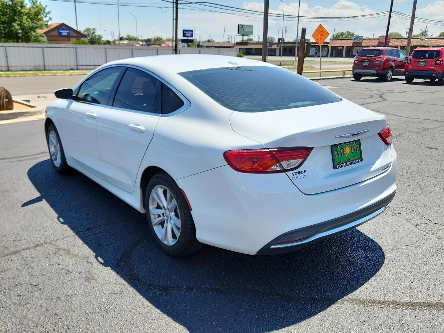 2015 Bright White Clearcoat /Black Chrysler 200 Limited (1C3CCCAB5FN) with an ENGINE: 2.4L I4 PZEV M-AIR engine, located at 4711 Ave Q, Lubbock, TX, 79412, (806) 687-2362, 33.551304, -101.855293 - Photo#2