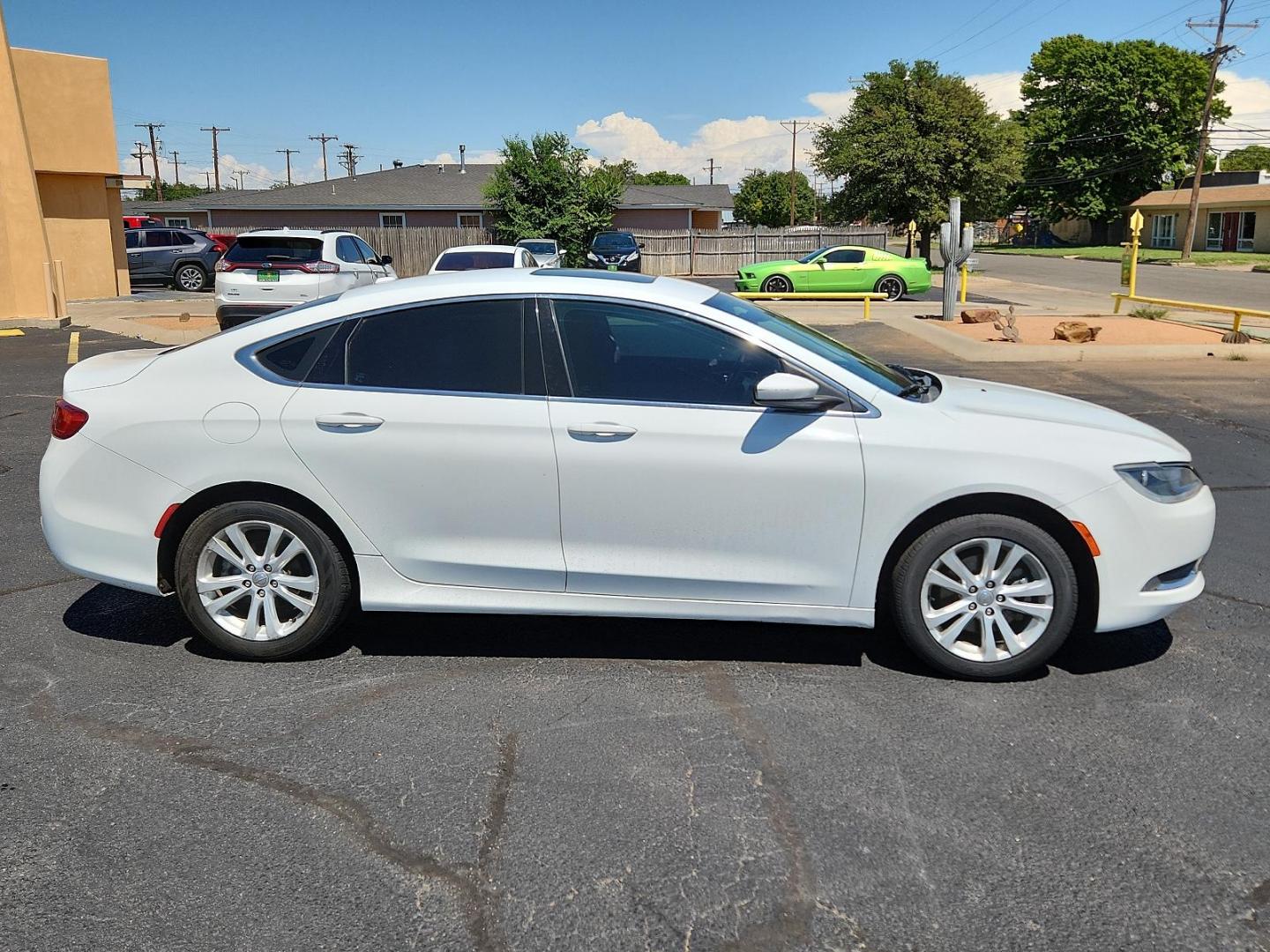 2015 Bright White Clearcoat /Black Chrysler 200 Limited (1C3CCCAB5FN) with an ENGINE: 2.4L I4 PZEV M-AIR engine, located at 4711 Ave Q, Lubbock, TX, 79412, (806) 687-2362, 33.551304, -101.855293 - Photo#5