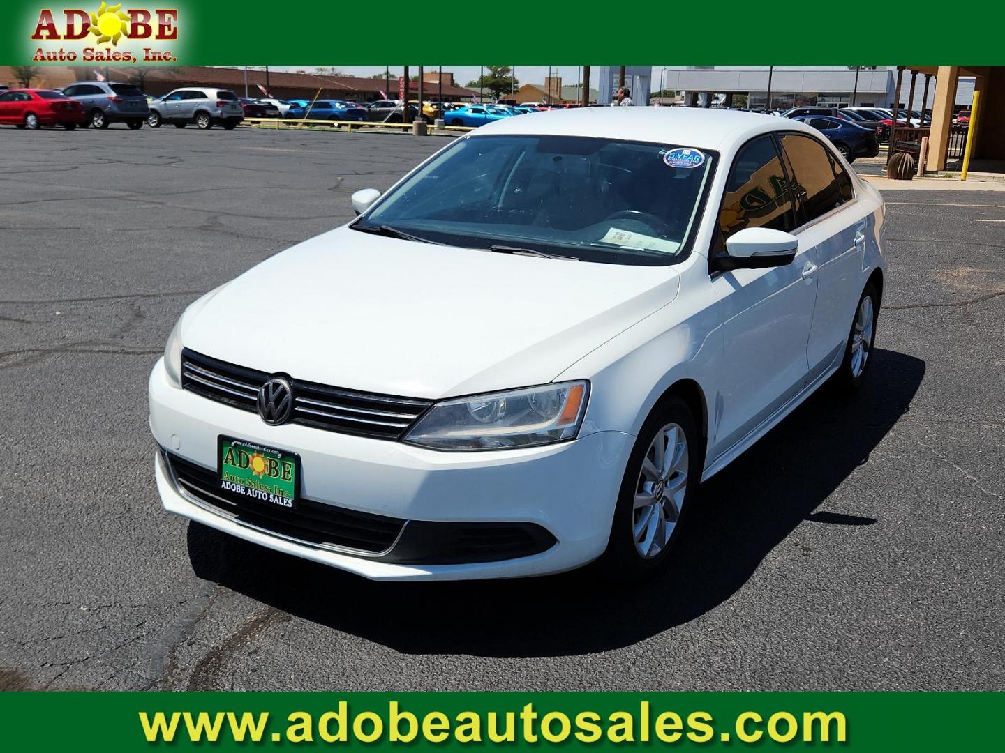 2014 Candy White /Titan Black Volkswagen Jetta Sedan SE w/Connectivity (3VWD17AJ6EM) with an Engine: 1.8L l-4 DOHC engine, located at 4711 Ave Q, Lubbock, TX, 79412, (806) 687-2362, 33.551304, -101.855293 - Photo#0