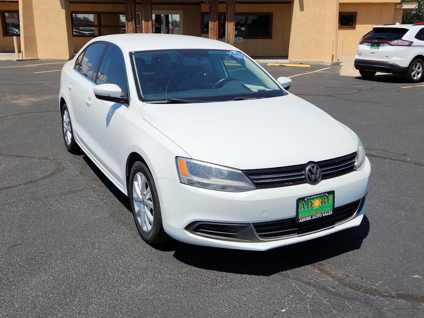 2014 Candy White /Titan Black Volkswagen Jetta Sedan SE w/Connectivity (3VWD17AJ6EM) with an Engine: 1.8L l-4 DOHC engine, located at 4711 Ave Q, Lubbock, TX, 79412, (806) 687-2362, 33.551304, -101.855293 - Photo#6