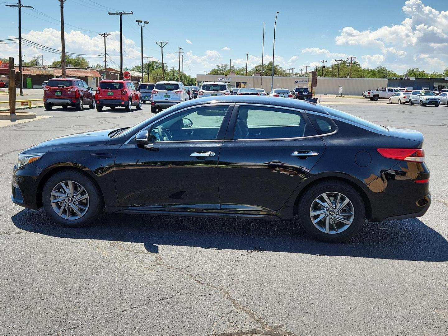 2019 Ebony Black /Black Cloth, cloth Kia Optima LX (5XXGT4L39KG) with an Engine: 2.4L DOHC I4 GDI engine, located at 4711 Ave Q, Lubbock, TX, 79412, (806) 687-2362, 33.551304, -101.855293 - Photo#1