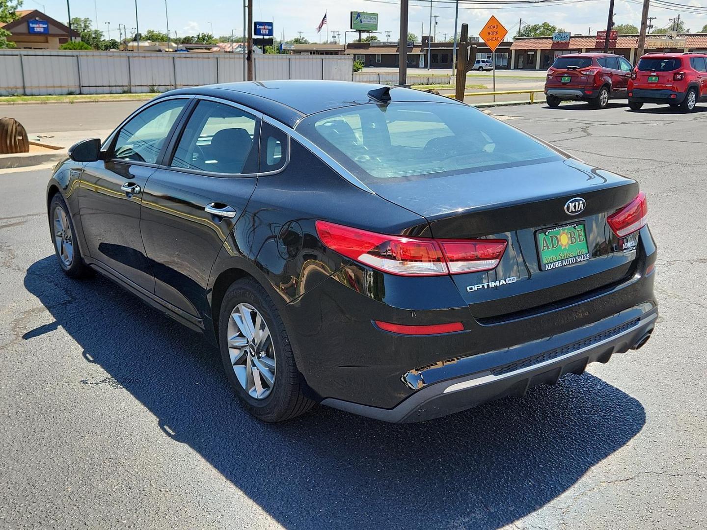 2019 Ebony Black /Black Cloth, cloth Kia Optima LX (5XXGT4L39KG) with an Engine: 2.4L DOHC I4 GDI engine, located at 4711 Ave Q, Lubbock, TX, 79412, (806) 687-2362, 33.551304, -101.855293 - Photo#2