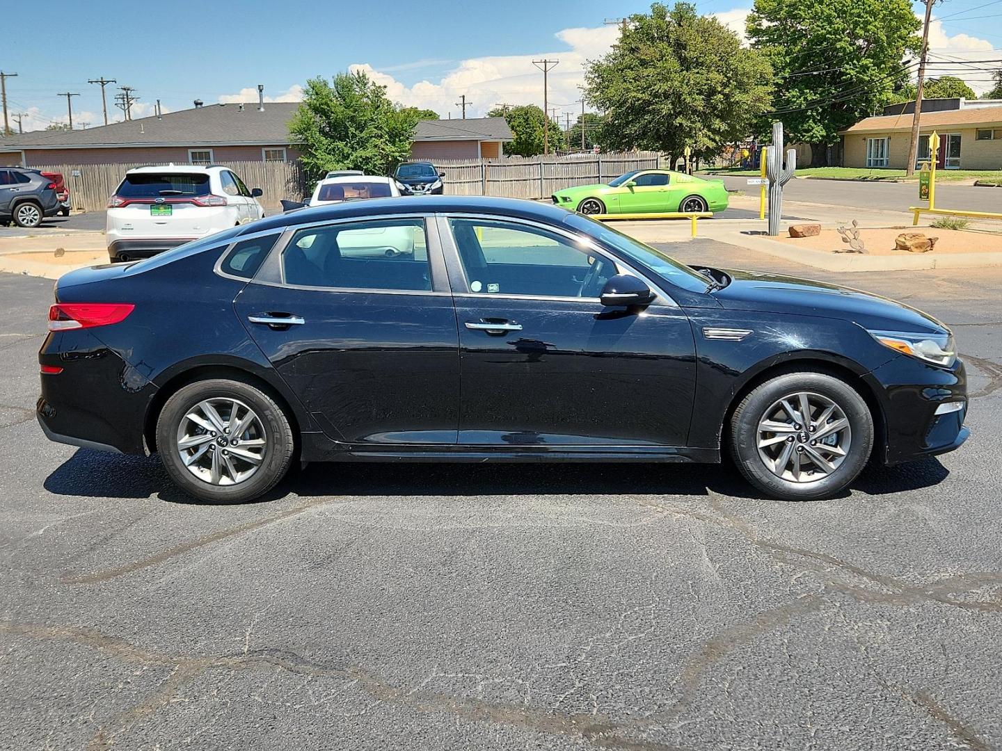 2019 Ebony Black /Black Cloth, cloth Kia Optima LX (5XXGT4L39KG) with an Engine: 2.4L DOHC I4 GDI engine, located at 4711 Ave Q, Lubbock, TX, 79412, (806) 687-2362, 33.551304, -101.855293 - Photo#5