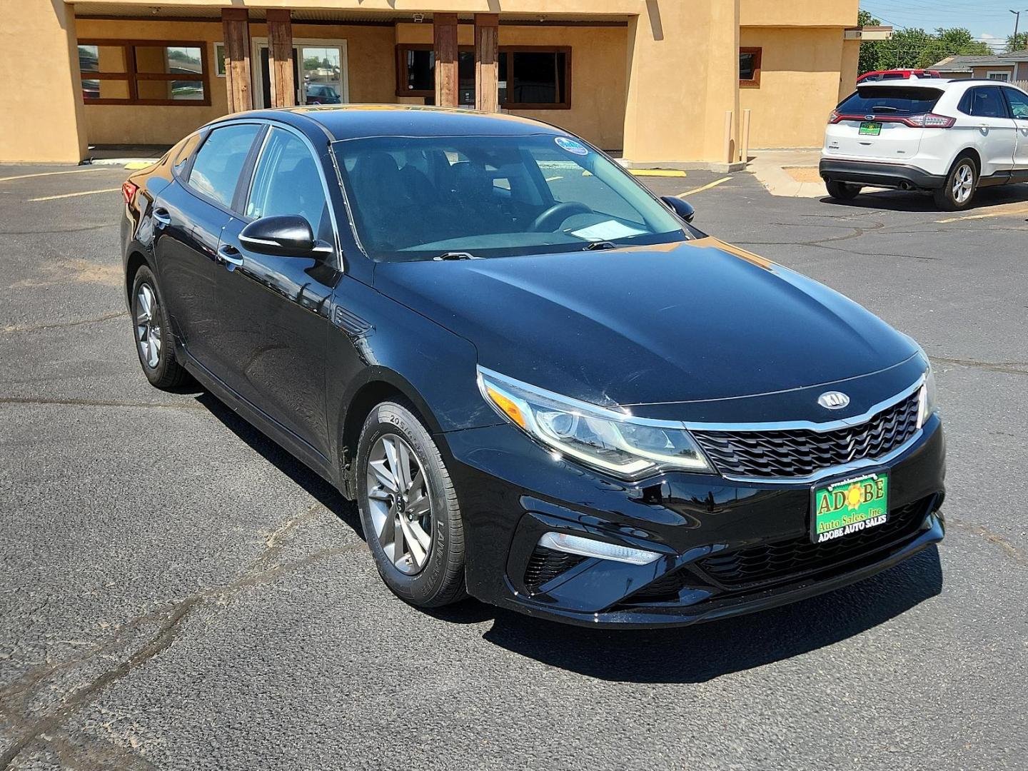 2019 Ebony Black /Black Cloth, cloth Kia Optima LX (5XXGT4L39KG) with an Engine: 2.4L DOHC I4 GDI engine, located at 4711 Ave Q, Lubbock, TX, 79412, (806) 687-2362, 33.551304, -101.855293 - Photo#6