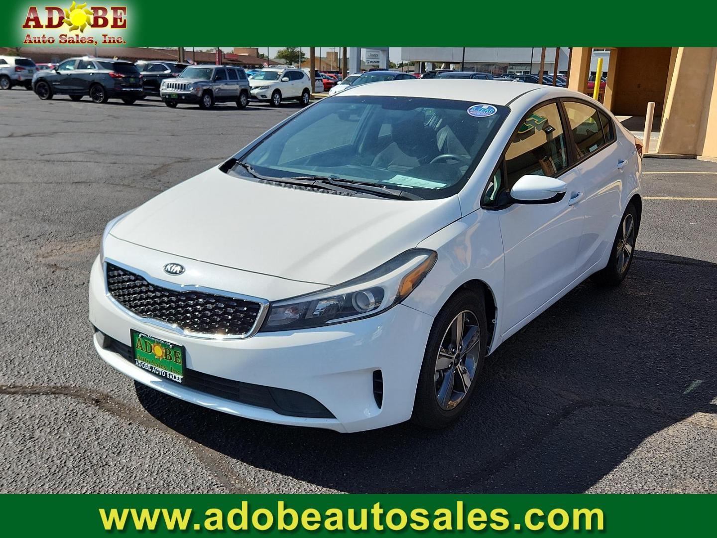 2018 Snow White Pearl /Black, cloth Kia Forte LX (3KPFL4A72JE) with an Engine: 2.0L I4 DOHC D-CVVT MPI engine, located at 4711 Ave Q, Lubbock, TX, 79412, (806) 687-2362, 33.551304, -101.855293 - Photo#0