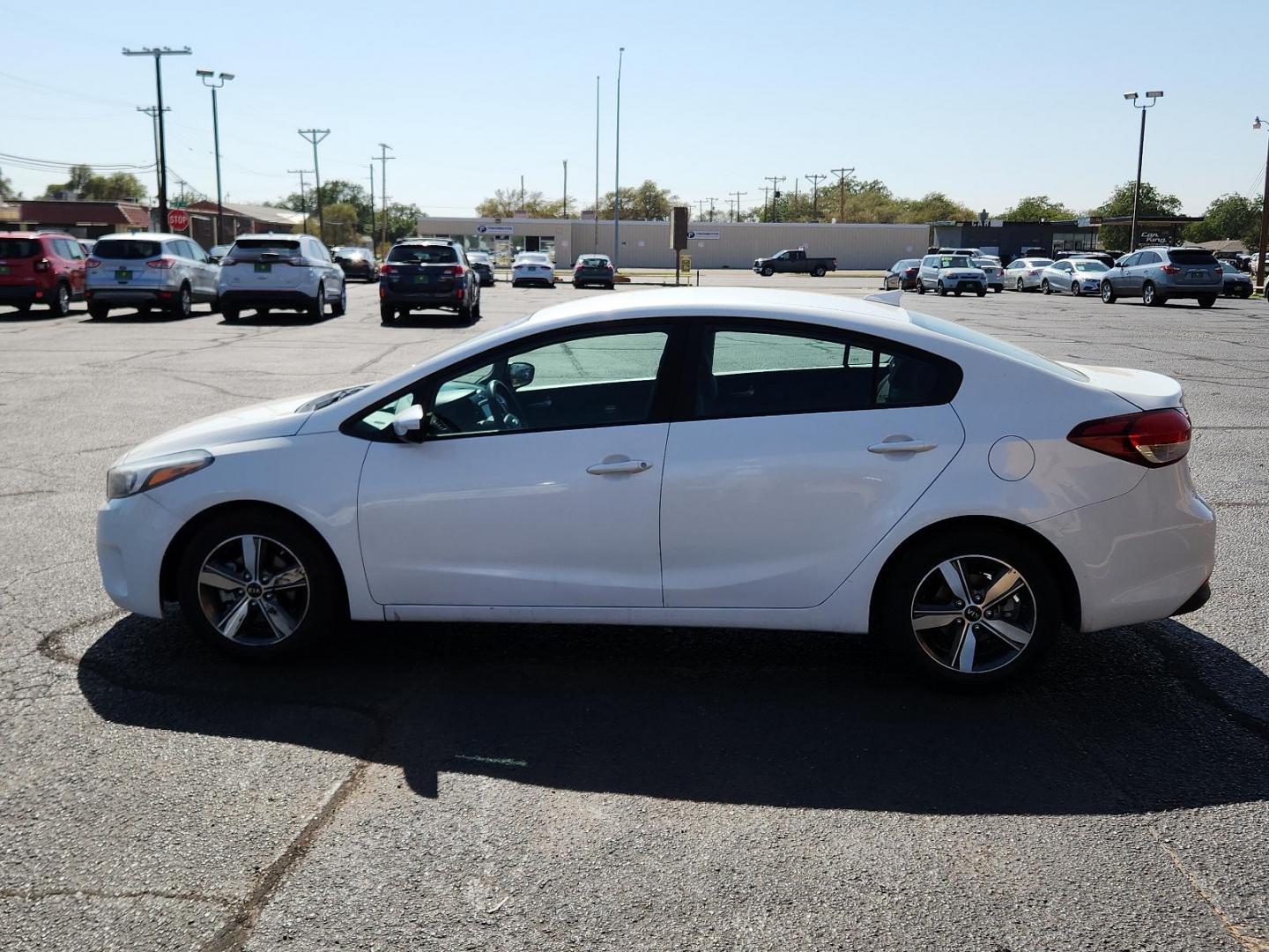 2018 Snow White Pearl /Black, cloth Kia Forte LX (3KPFL4A72JE) with an Engine: 2.0L I4 DOHC D-CVVT MPI engine, located at 4711 Ave Q, Lubbock, TX, 79412, (806) 687-2362, 33.551304, -101.855293 - Photo#1