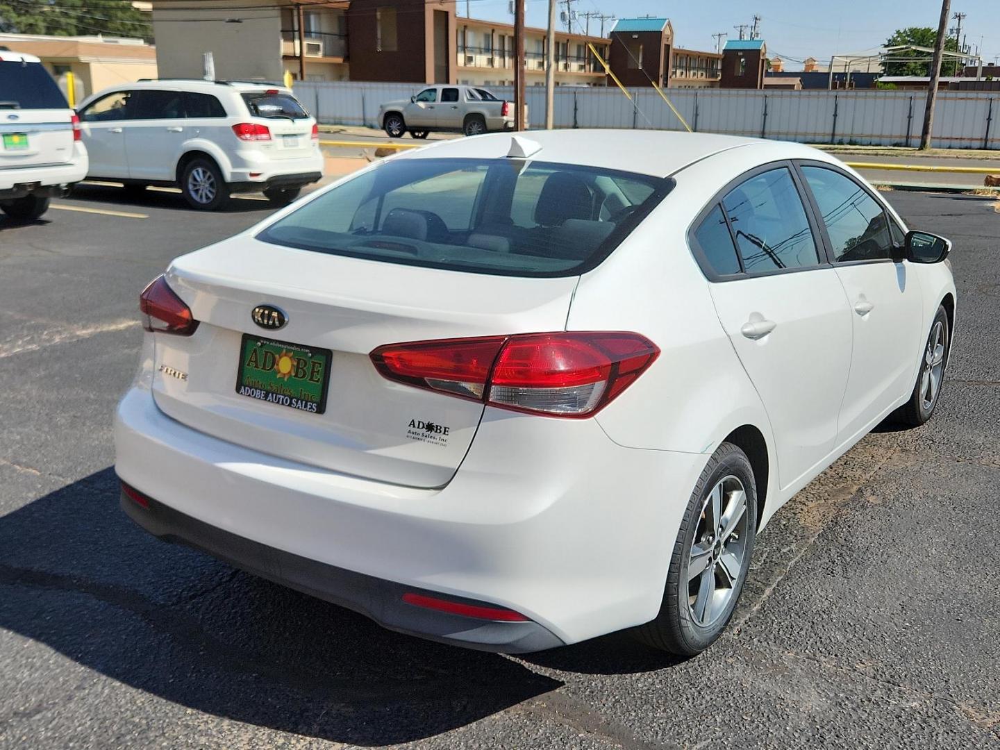 2018 Snow White Pearl /Black, cloth Kia Forte LX (3KPFL4A72JE) with an Engine: 2.0L I4 DOHC D-CVVT MPI engine, located at 4711 Ave Q, Lubbock, TX, 79412, (806) 687-2362, 33.551304, -101.855293 - Photo#3