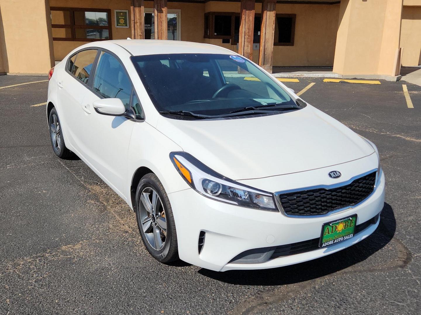 2018 Snow White Pearl /Black, cloth Kia Forte LX (3KPFL4A72JE) with an Engine: 2.0L I4 DOHC D-CVVT MPI engine, located at 4711 Ave Q, Lubbock, TX, 79412, (806) 687-2362, 33.551304, -101.855293 - Photo#5