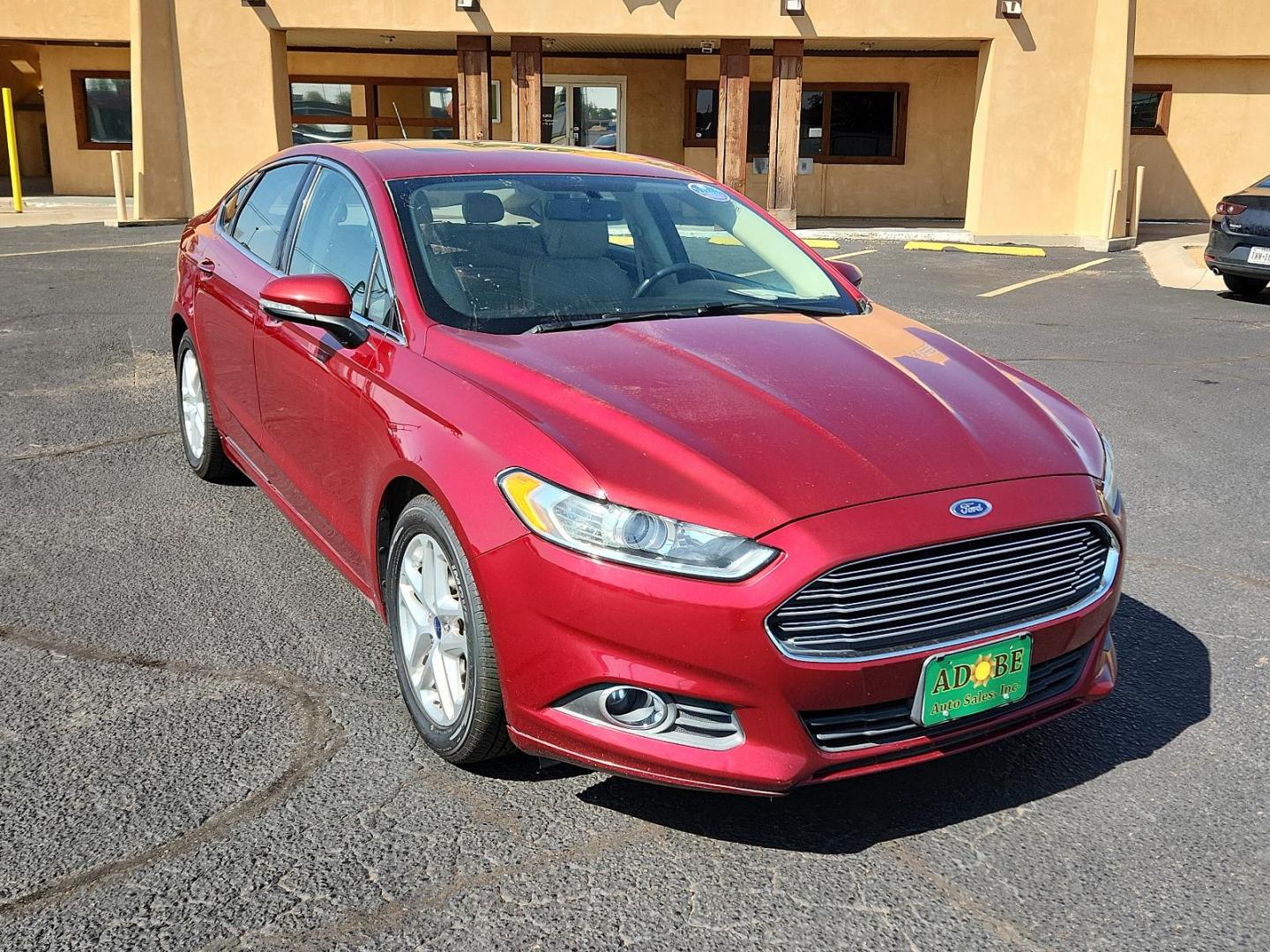 2016 Ruby Red Metallic Tinted Clearcoat /Charcoal Black, cloth Ford Fusion SE (3FA6P0HD3GR) with an ENGINE: 1.5L ECOBOOST engine, located at 4711 Ave Q, Lubbock, TX, 79412, (806) 687-2362, 33.551304, -101.855293 - Photo#5