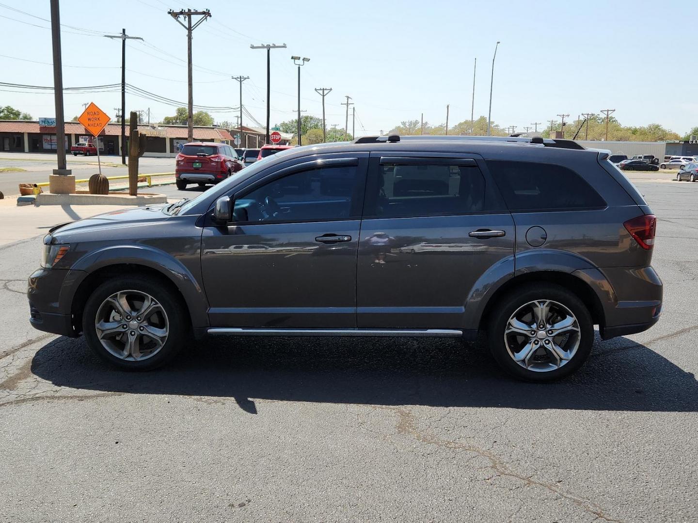 2016 Granite Crystal Metallic Clear Coat /Black, leather Dodge Journey Crossroad Plus (3C4PDCGB0GT) with an ENGINE: 2.4L I4 DOHC 16V DUAL VVT engine, located at 4711 Ave Q, Lubbock, TX, 79412, (806) 687-2362, 33.551304, -101.855293 - Photo#1