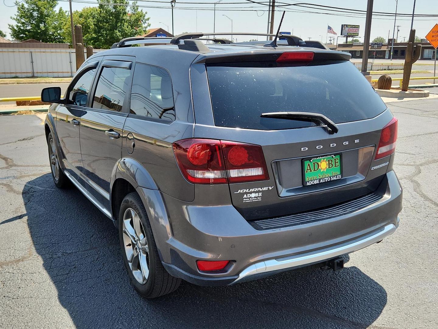 2016 Granite Crystal Metallic Clear Coat /Black, leather Dodge Journey Crossroad Plus (3C4PDCGB0GT) with an ENGINE: 2.4L I4 DOHC 16V DUAL VVT engine, located at 4711 Ave Q, Lubbock, TX, 79412, (806) 687-2362, 33.551304, -101.855293 - Photo#2