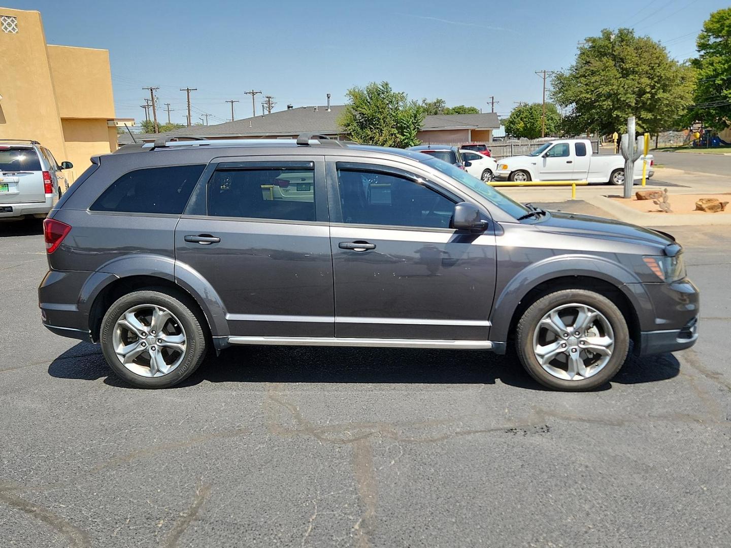 2016 Granite Crystal Metallic Clear Coat /Black, leather Dodge Journey Crossroad Plus (3C4PDCGB0GT) with an ENGINE: 2.4L I4 DOHC 16V DUAL VVT engine, located at 4711 Ave Q, Lubbock, TX, 79412, (806) 687-2362, 33.551304, -101.855293 - Photo#4