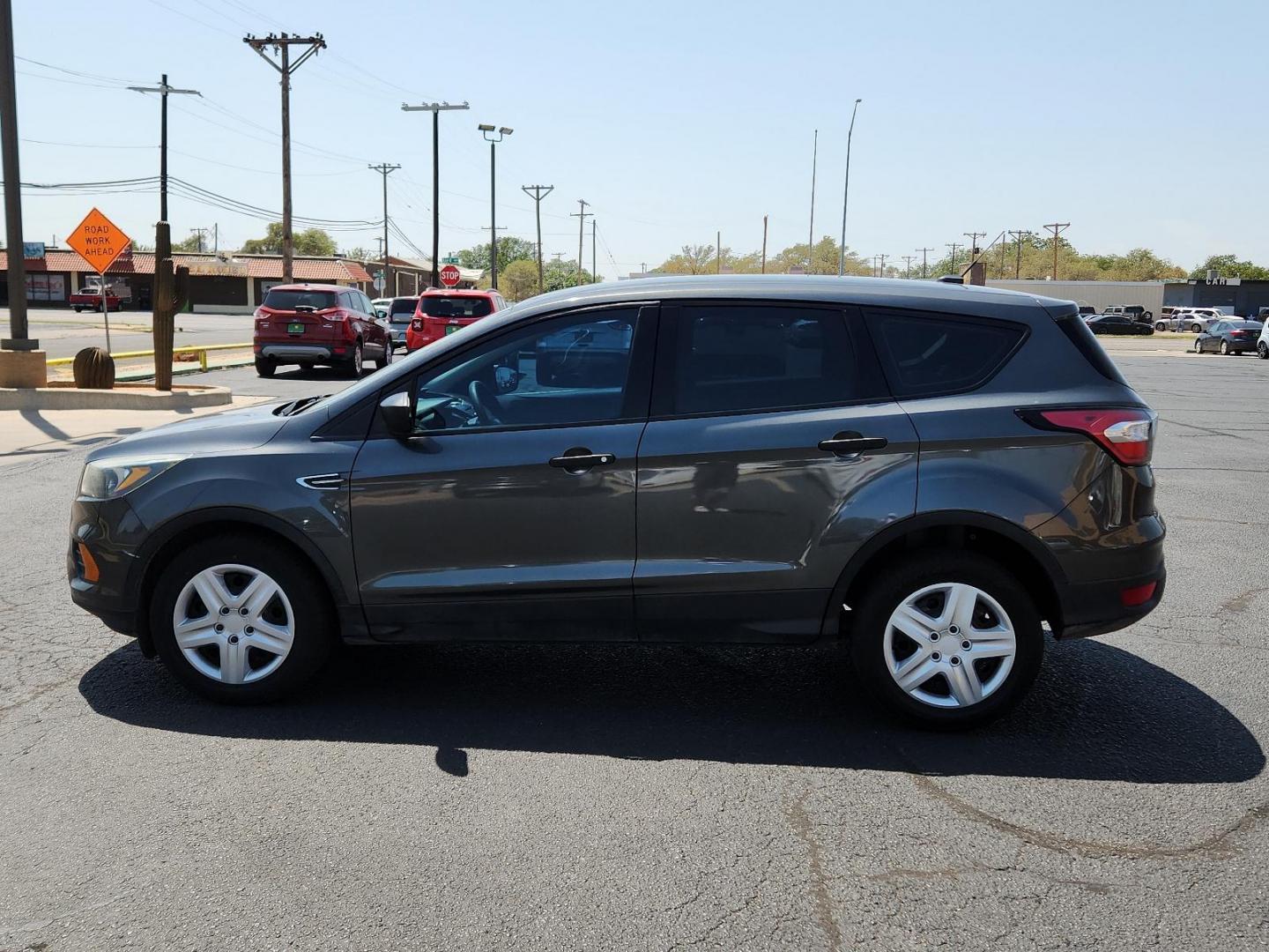 2018 Magnetic Metallic /Charcoal Black, cloth Ford Escape S (1FMCU0F77JU) with an 2.5L L4 DOHC 16V engine, located at 4711 Ave Q, Lubbock, TX, 79412, (806) 687-2362, 33.551304, -101.855293 - Photo#1